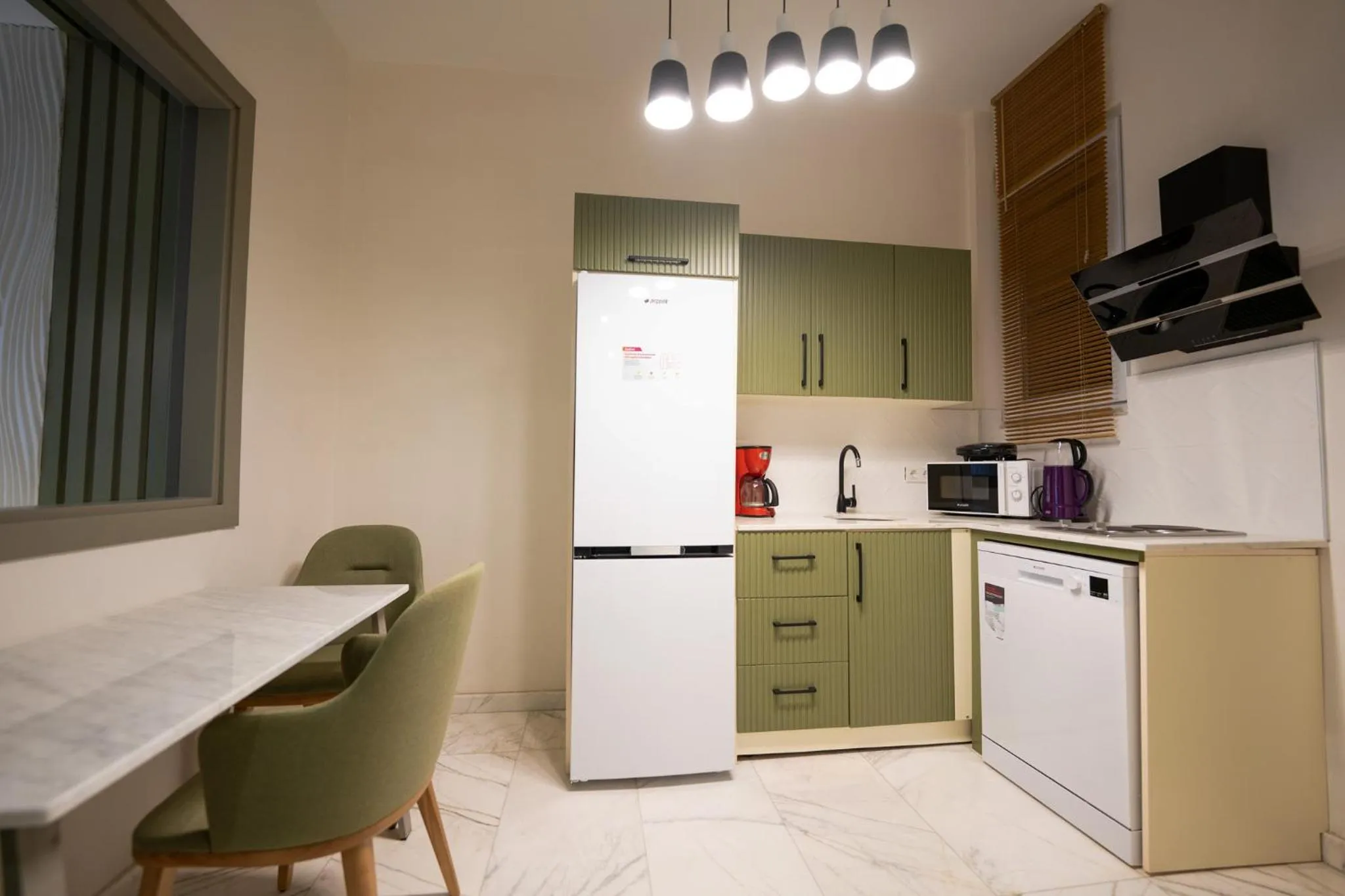 Coffee/tea facilities in Monev Suites Hotel