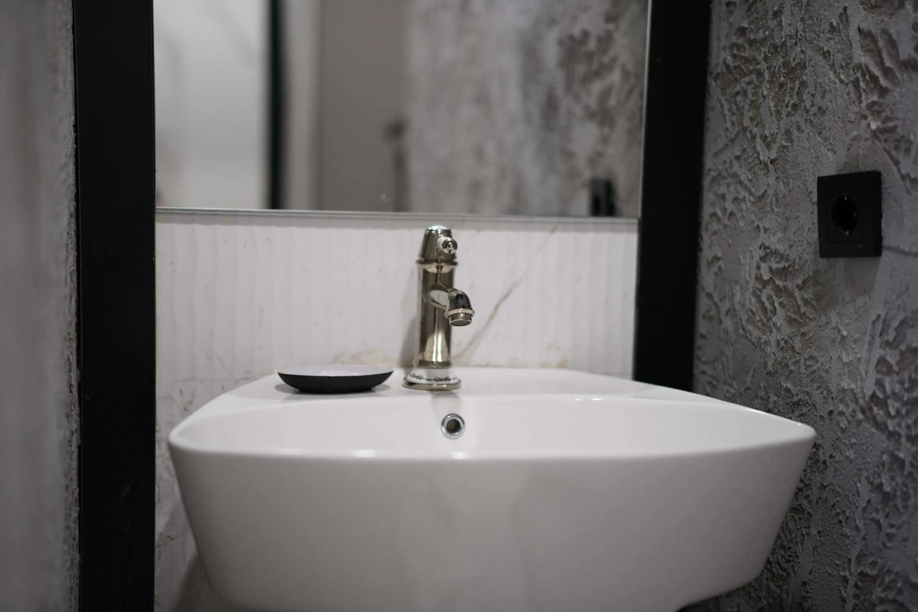 Bathroom in Monev Suites Hotel