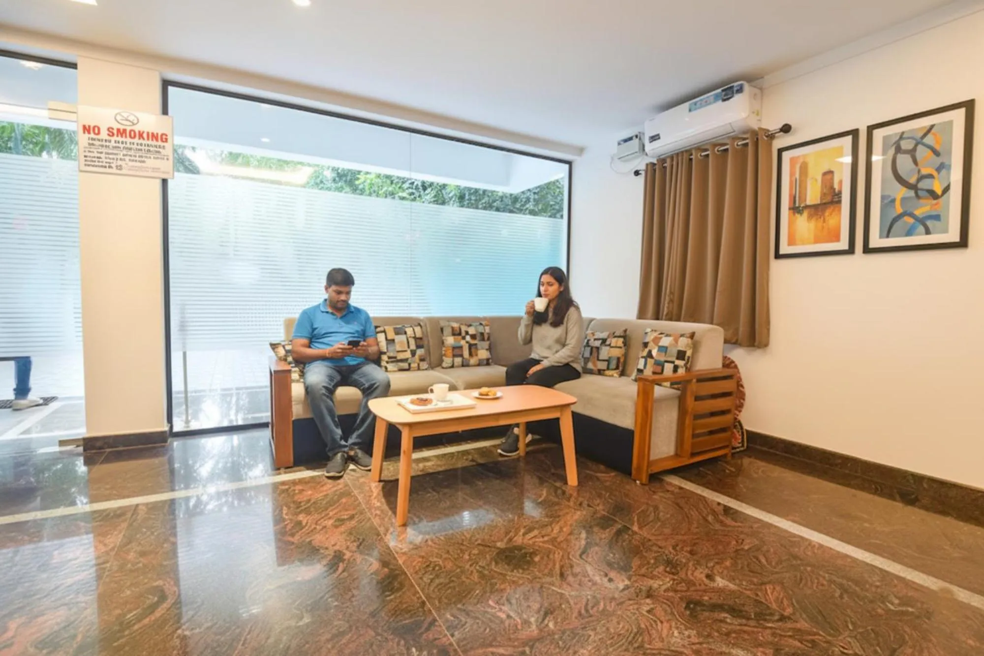 Seating area in Via MA Homes