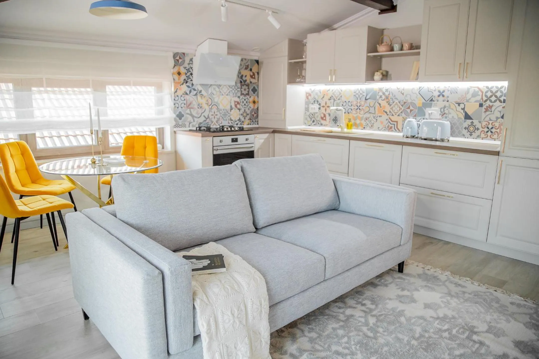 Kitchen or kitchenette in First Apartments