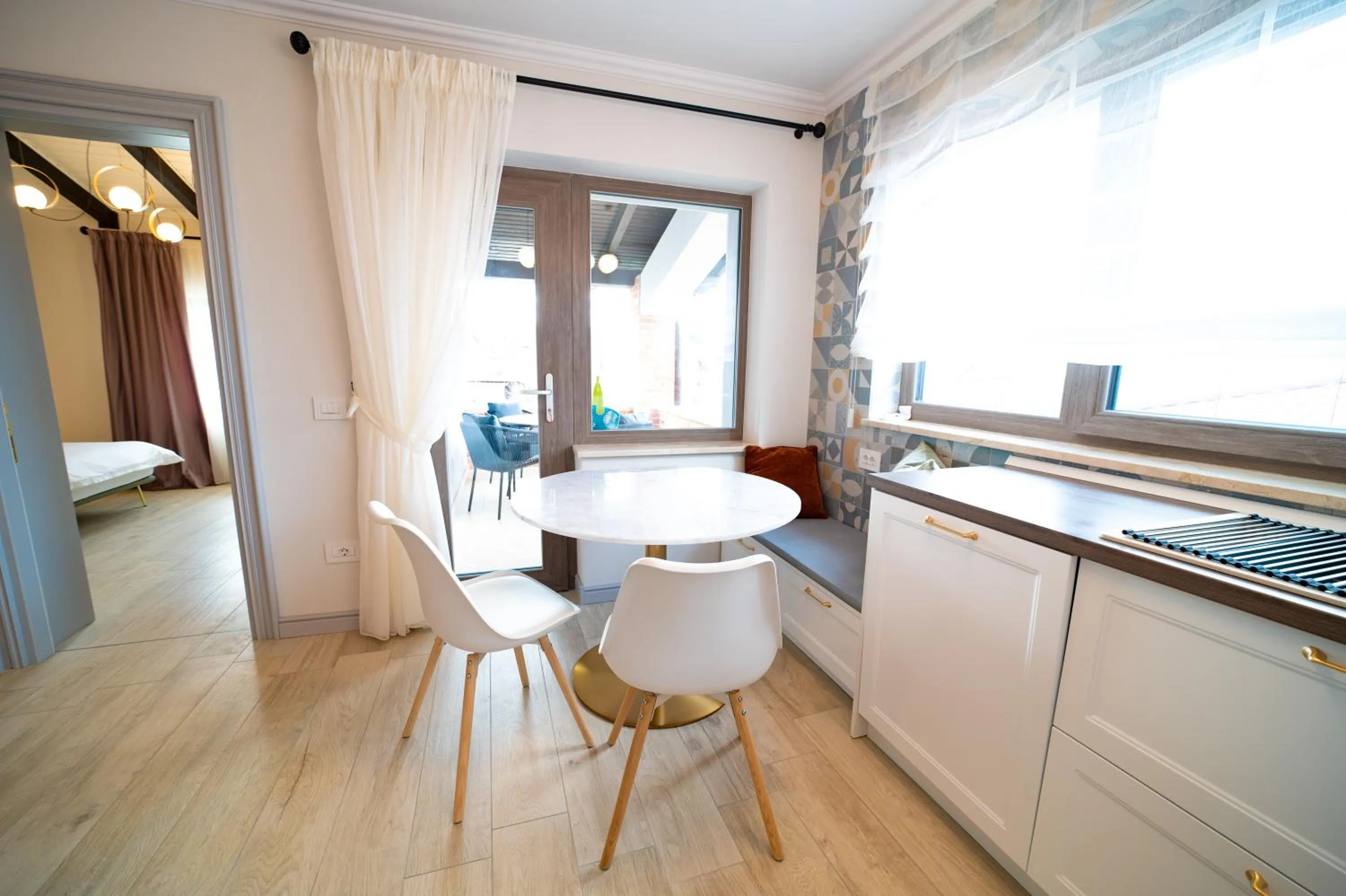 Kitchen or kitchenette in First Apartments