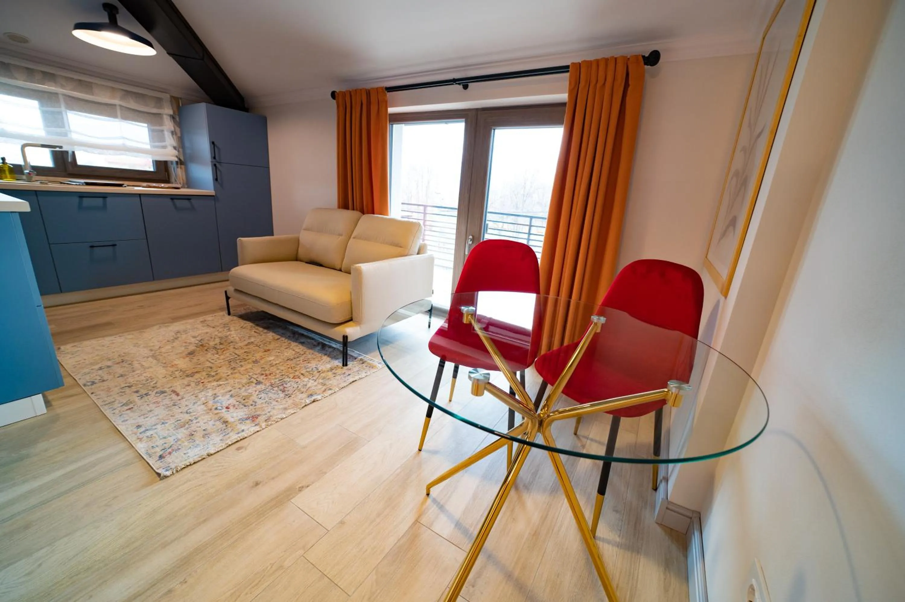 Kitchen or kitchenette in First Apartments