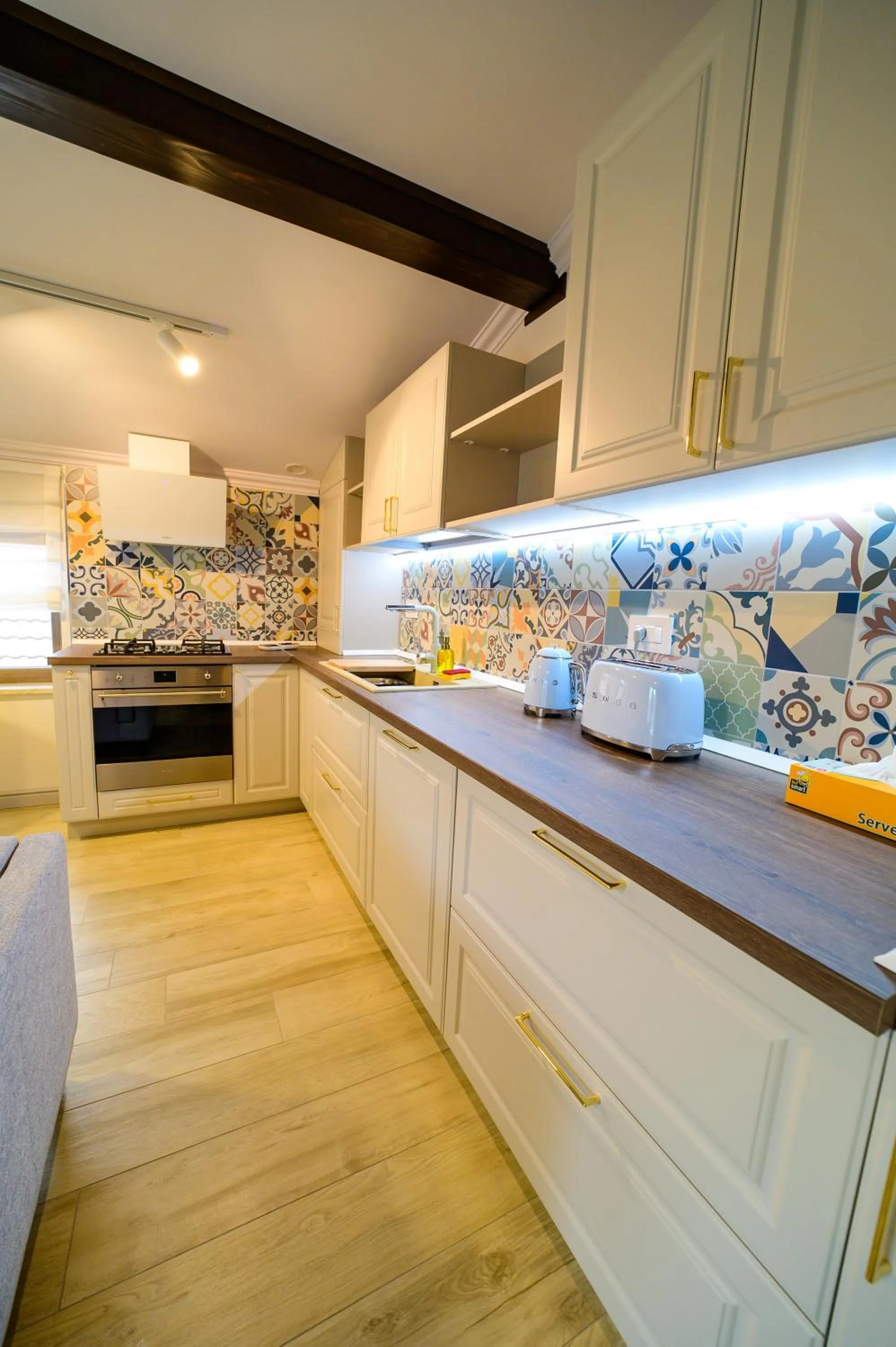 Kitchen or kitchenette in First Apartments