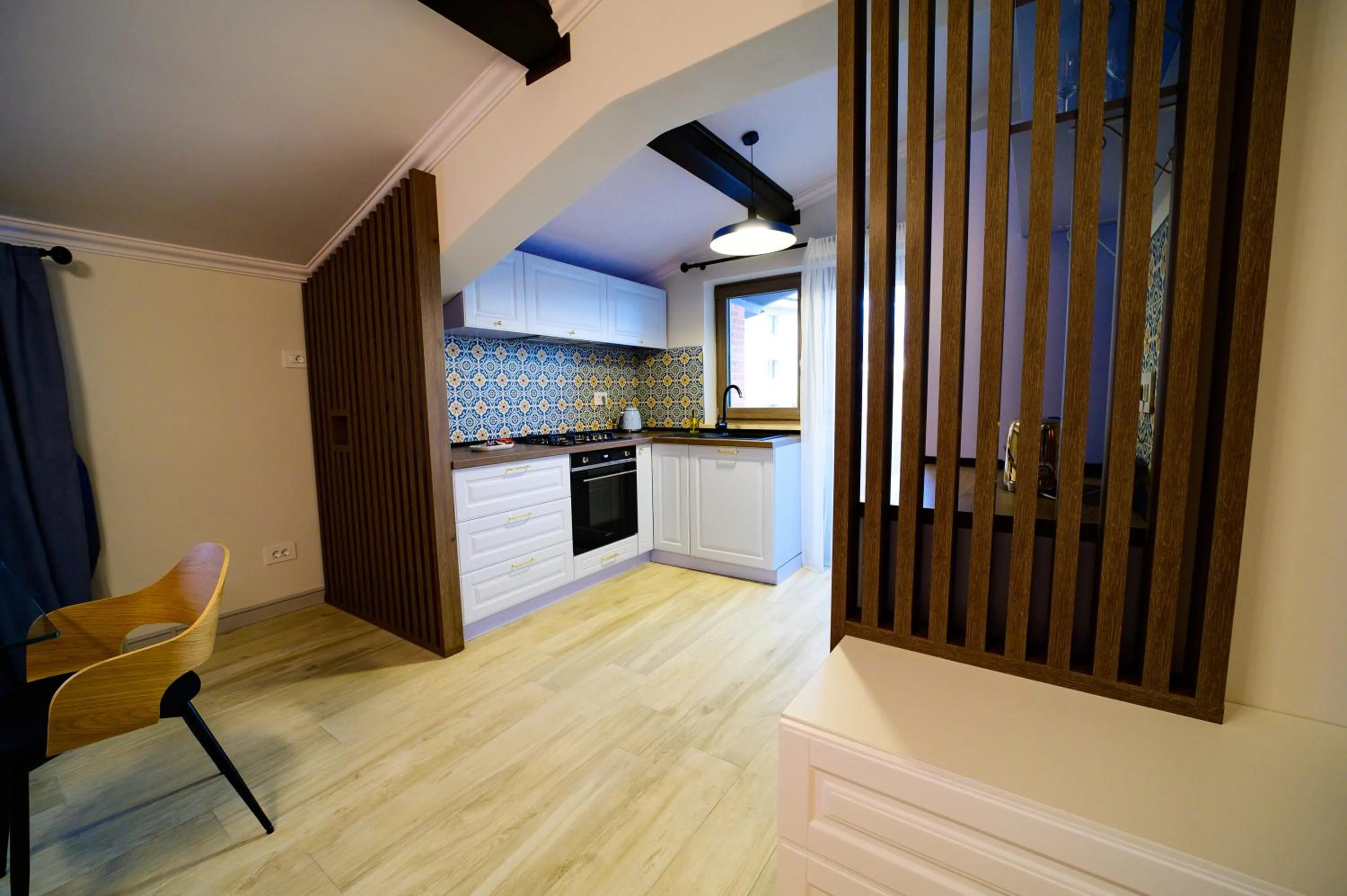 Kitchen or kitchenette in First Apartments