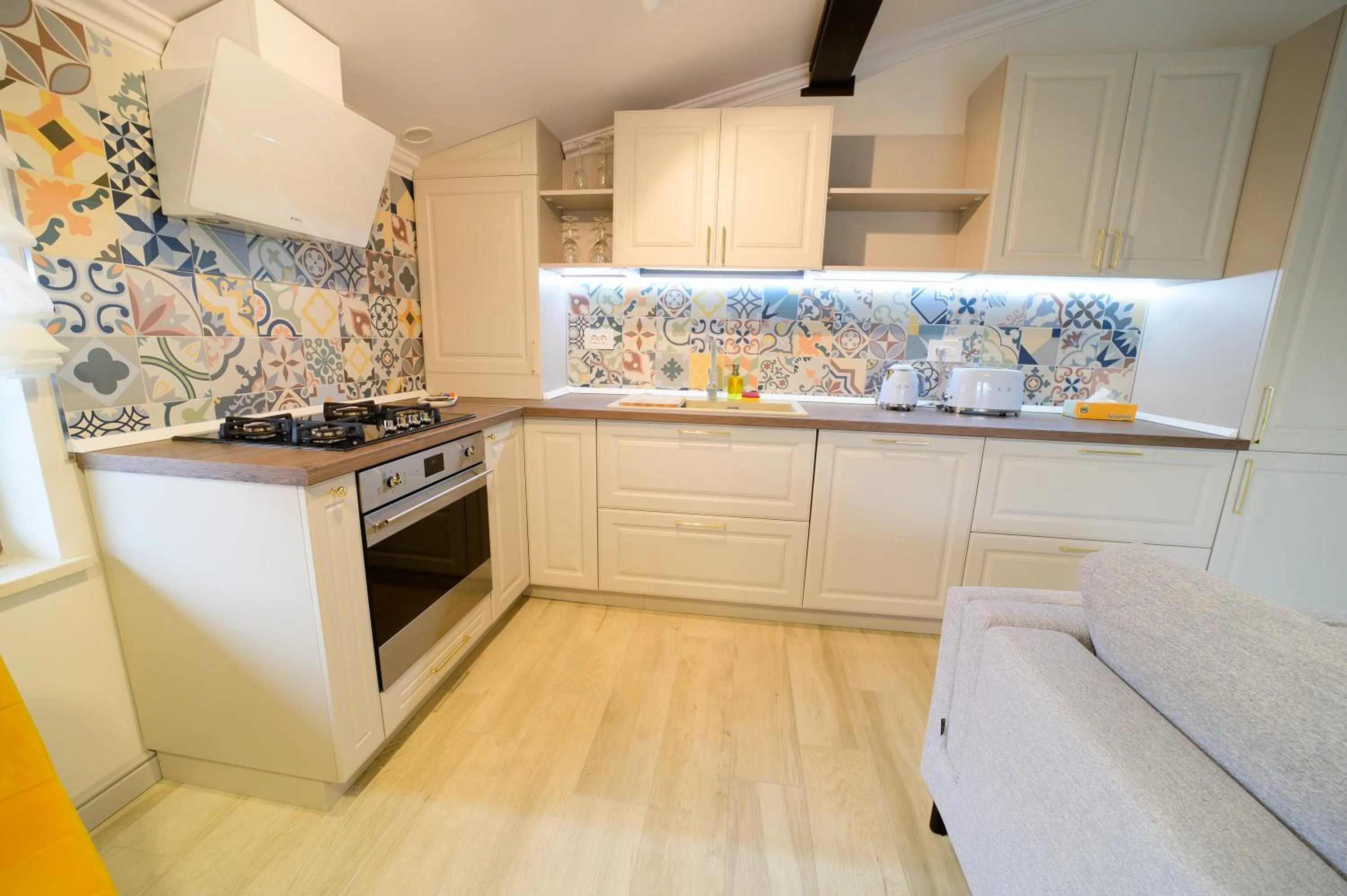 Kitchen or kitchenette in First Apartments