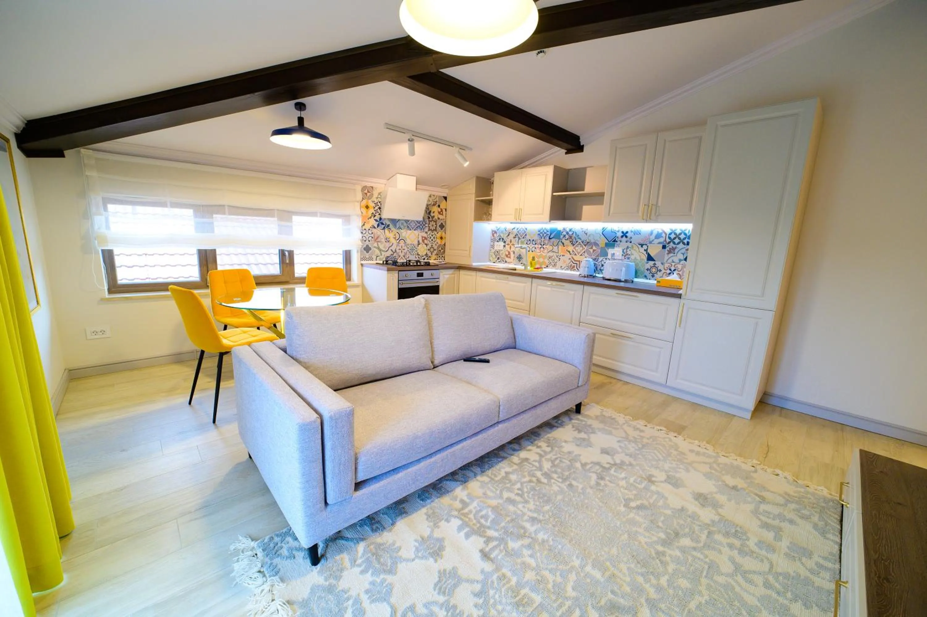 Kitchen or kitchenette in First Apartments