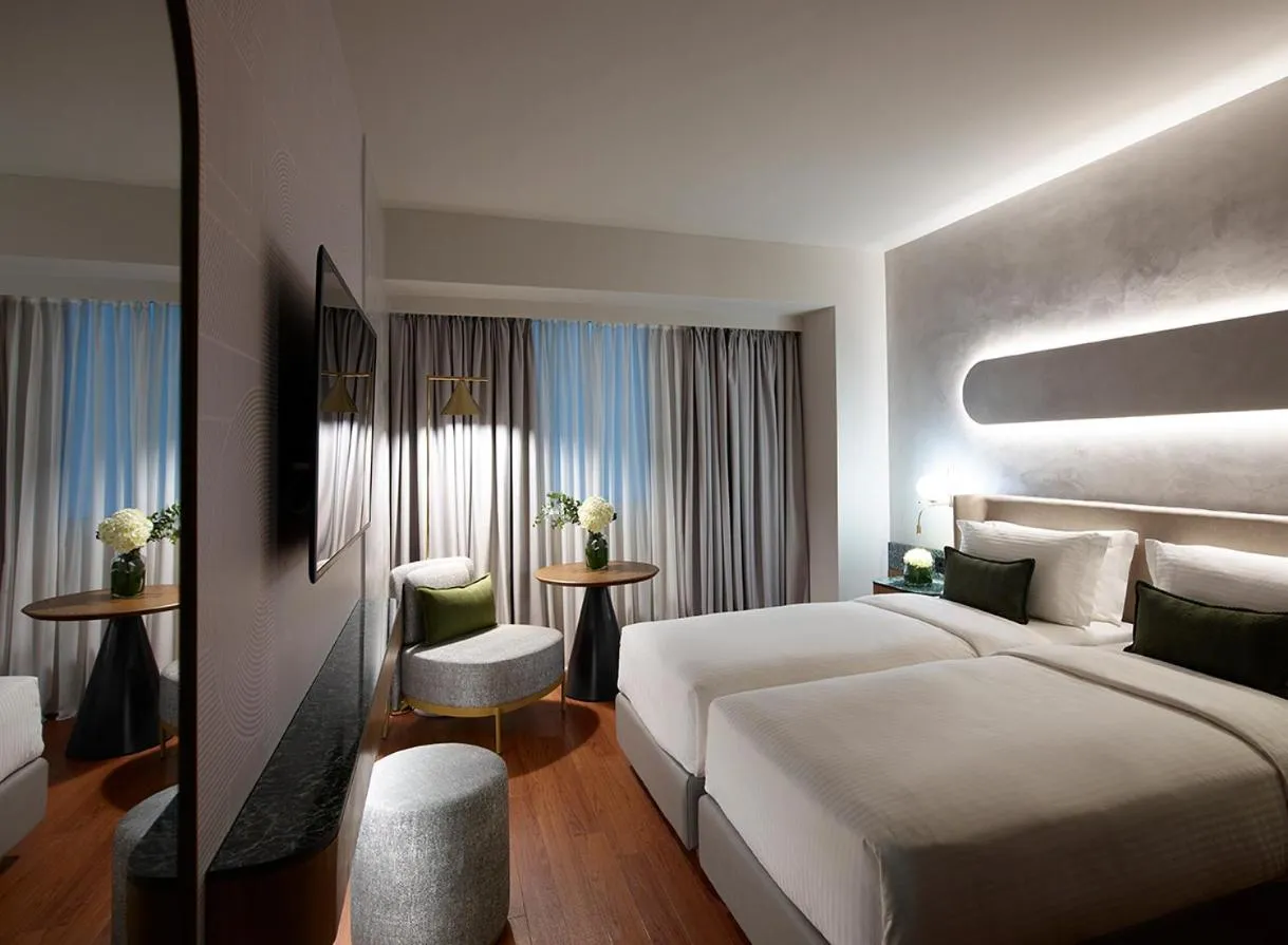 Bed in Titania Hotel