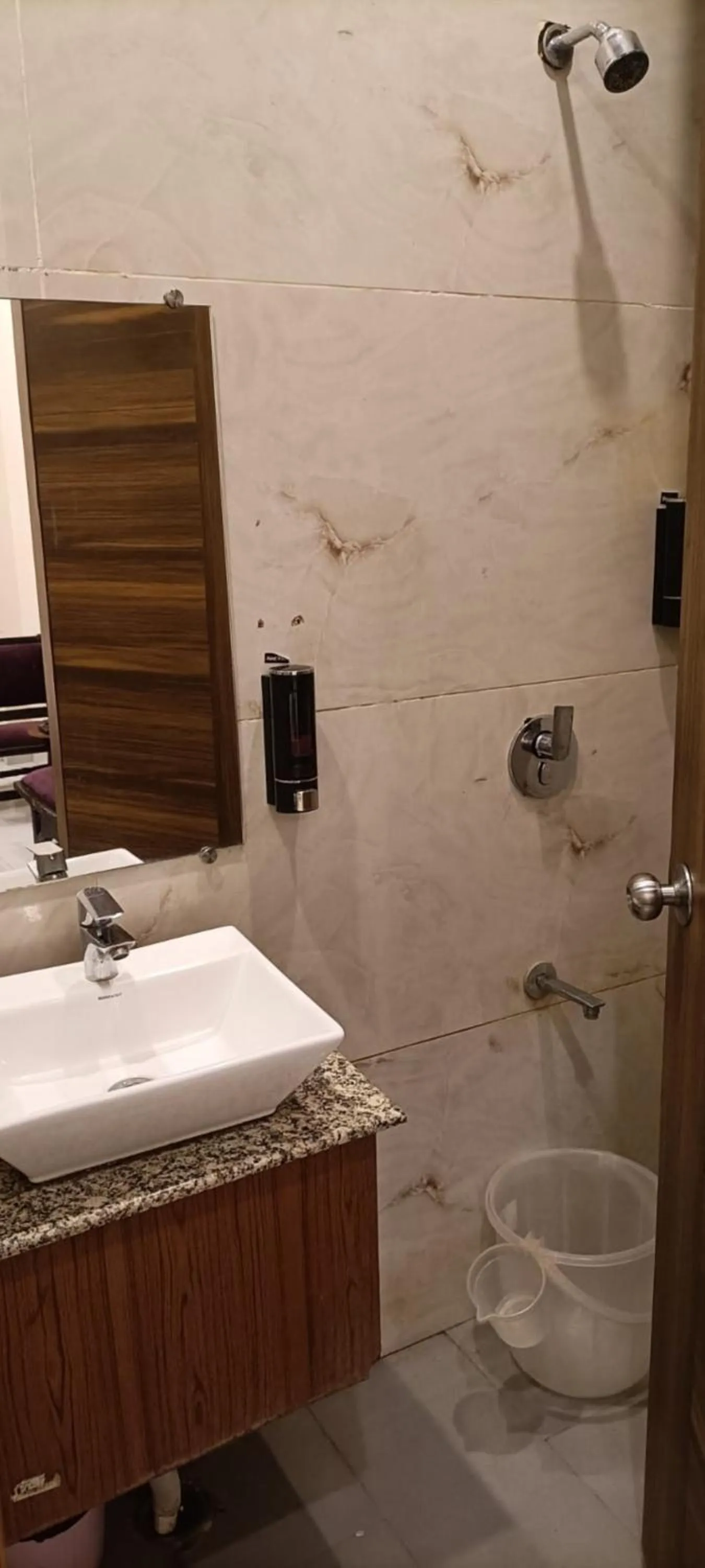 Bathroom in Perfectstayz Premium at Harkipauri Road - Ganga view rooftop cafe