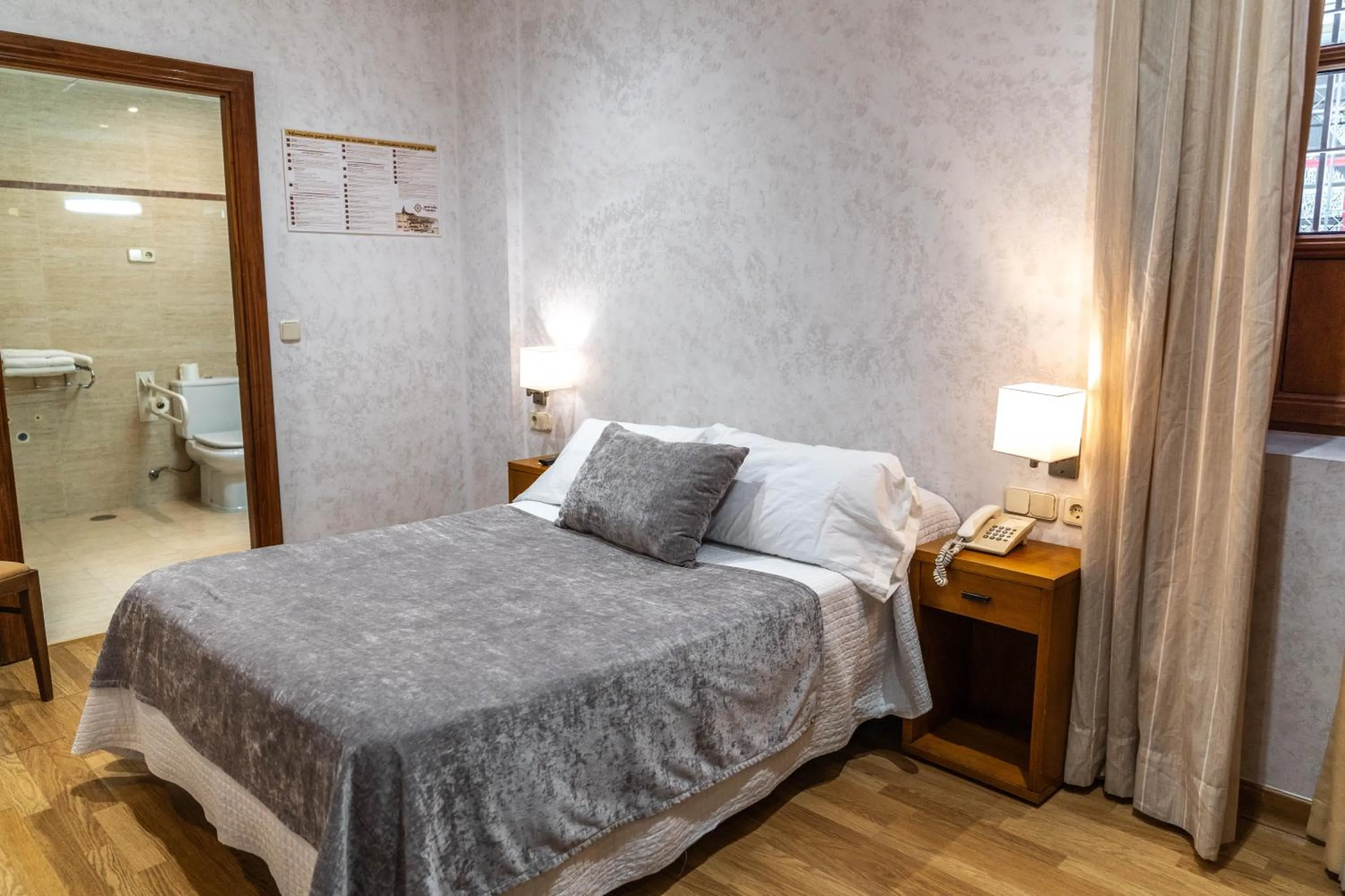 Bed in Hotel Granada Centro