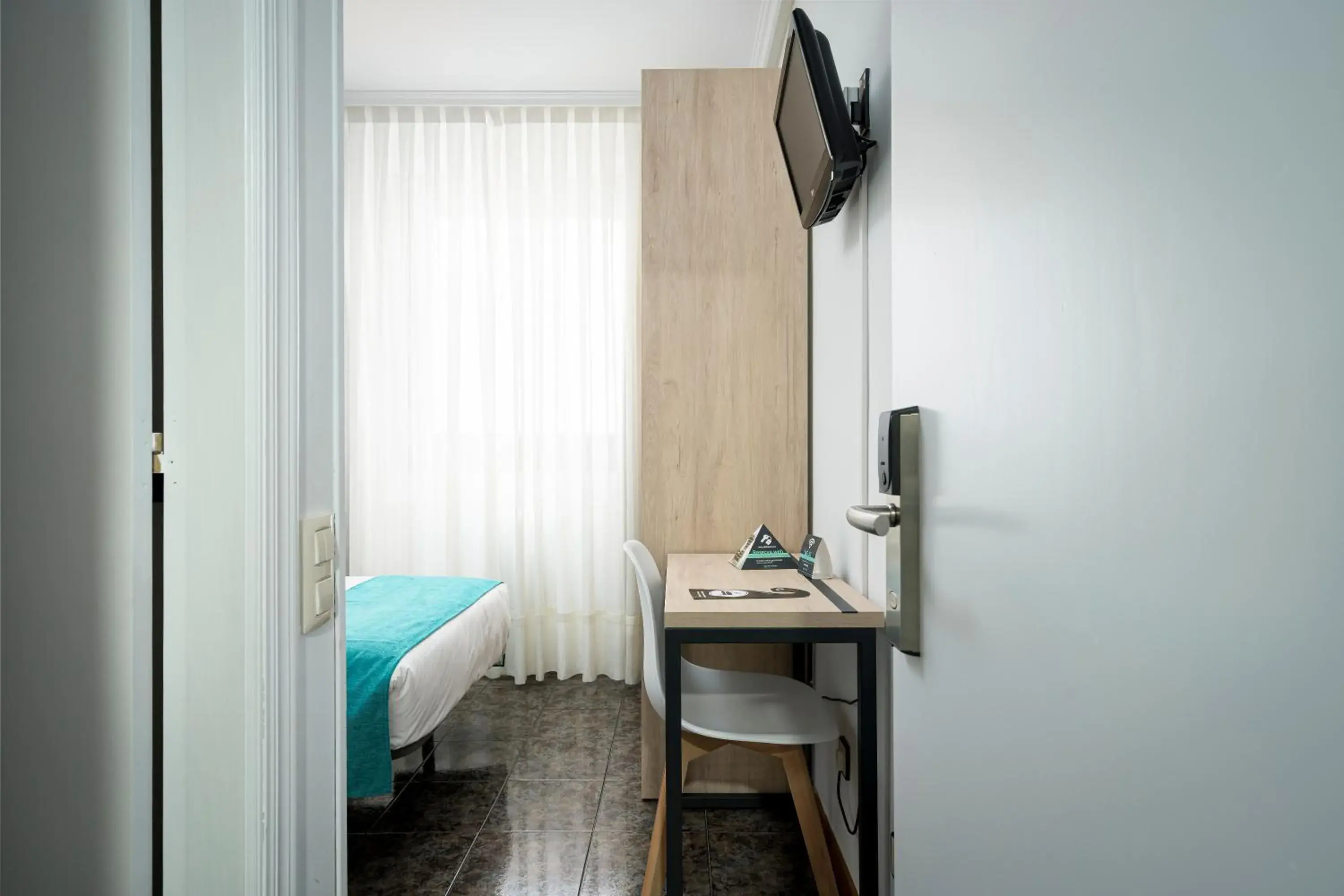 Bed in Hotel Alda Pasaje Bed in Hotel Alda Pasaje