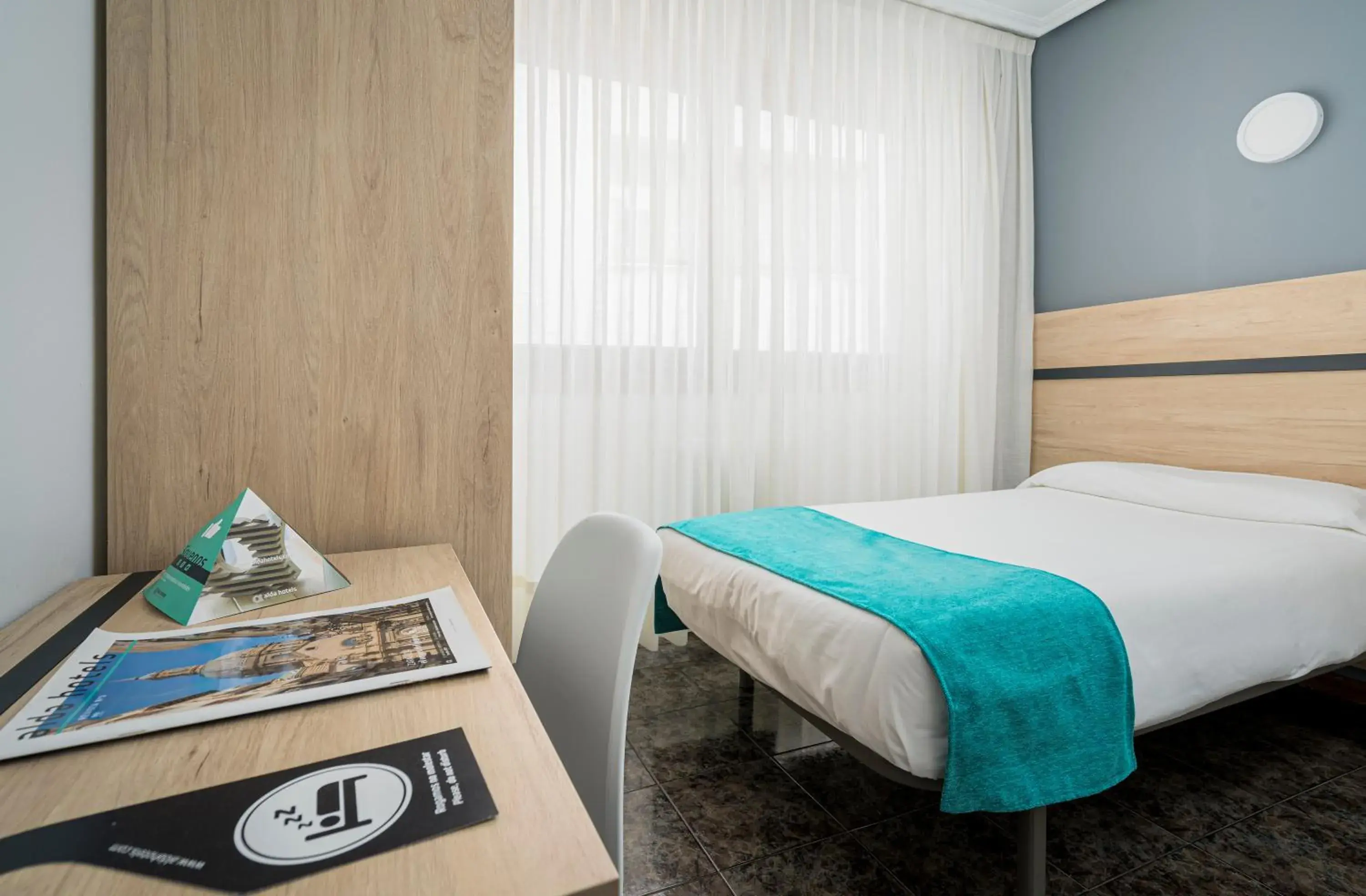 Bed in Hotel Alda Pasaje Bed in Hotel Alda Pasaje