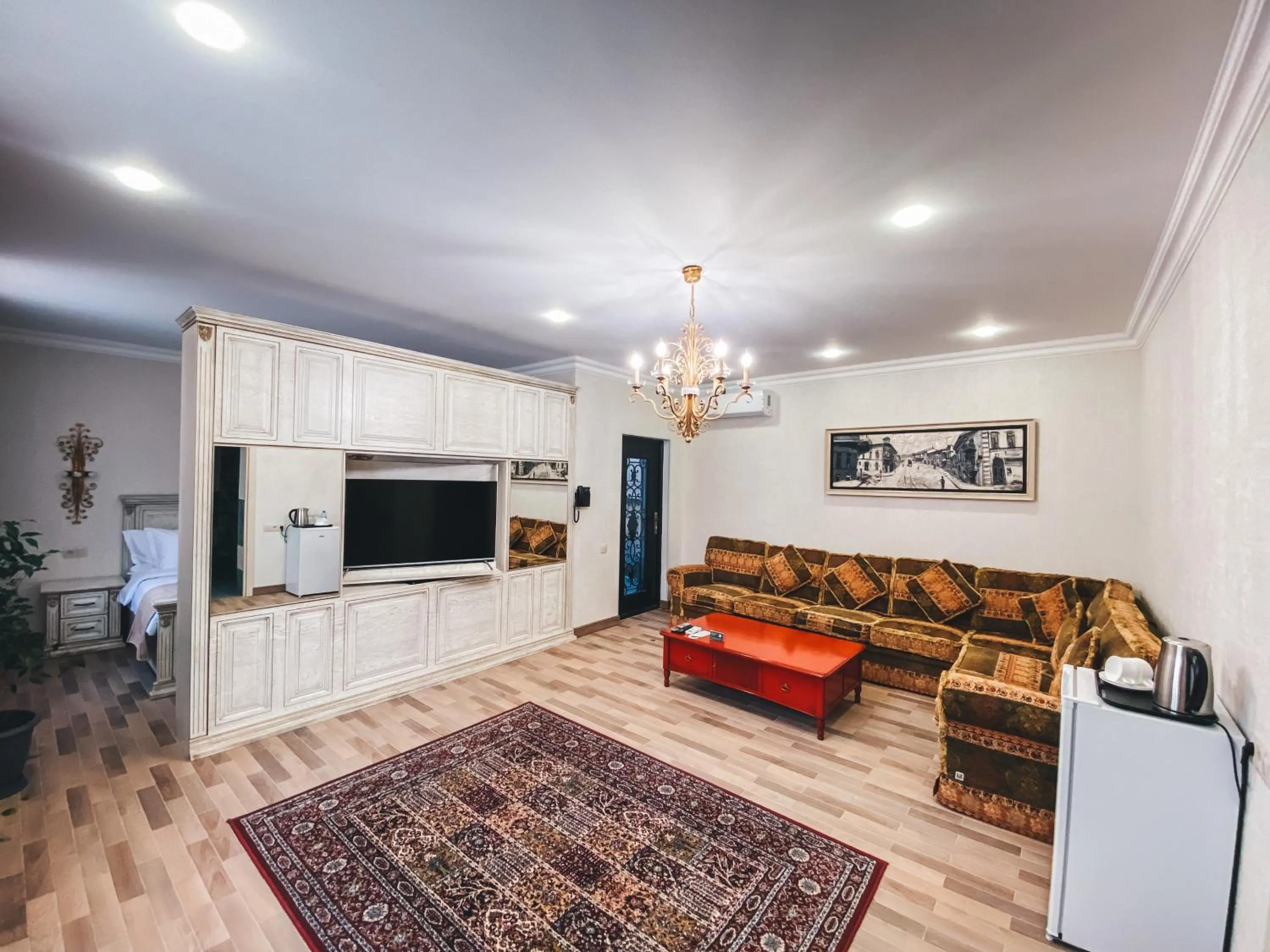 Communal lounge/ TV room in Aspar Boutique Hotel