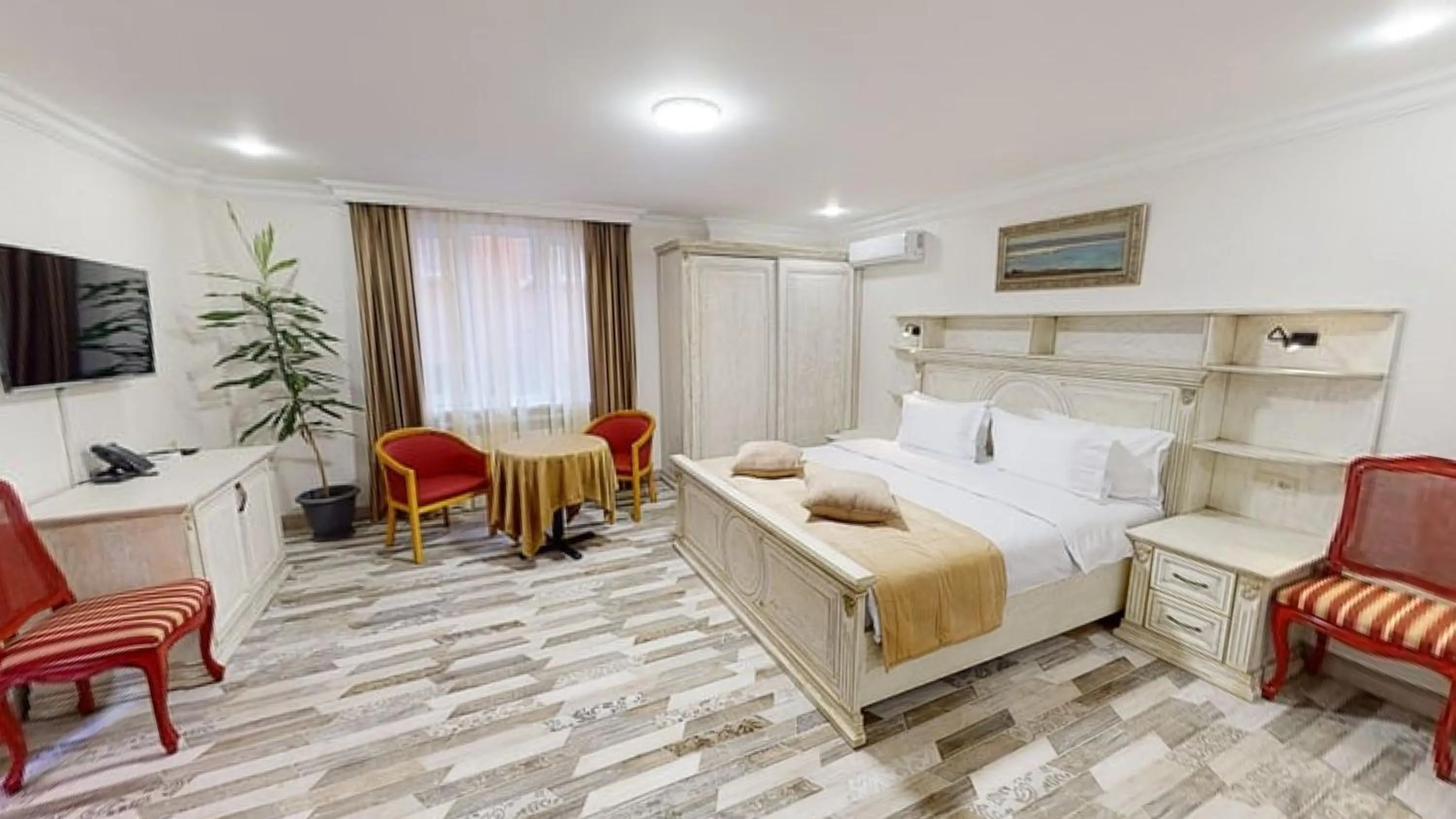 Communal lounge/ TV room, Bed in Aspar Boutique Hotel