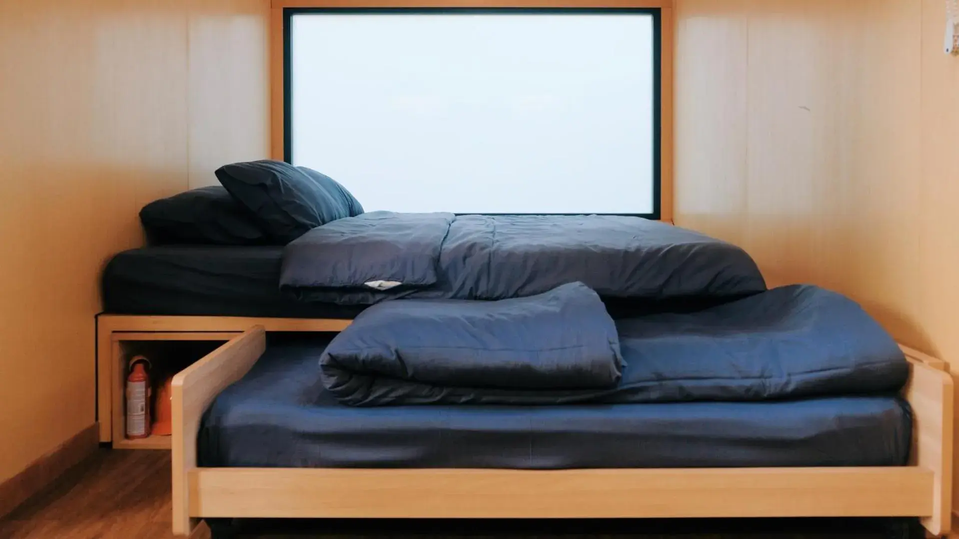 Bed in Bobocabin Madasari, Pangandaran Bed in Bobocabin Madasari, Pangandaran