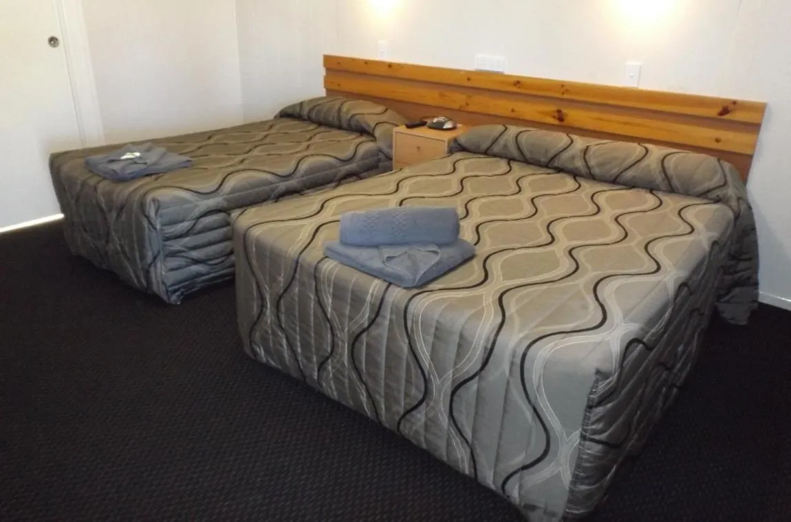 Bed in Three Moon Motel