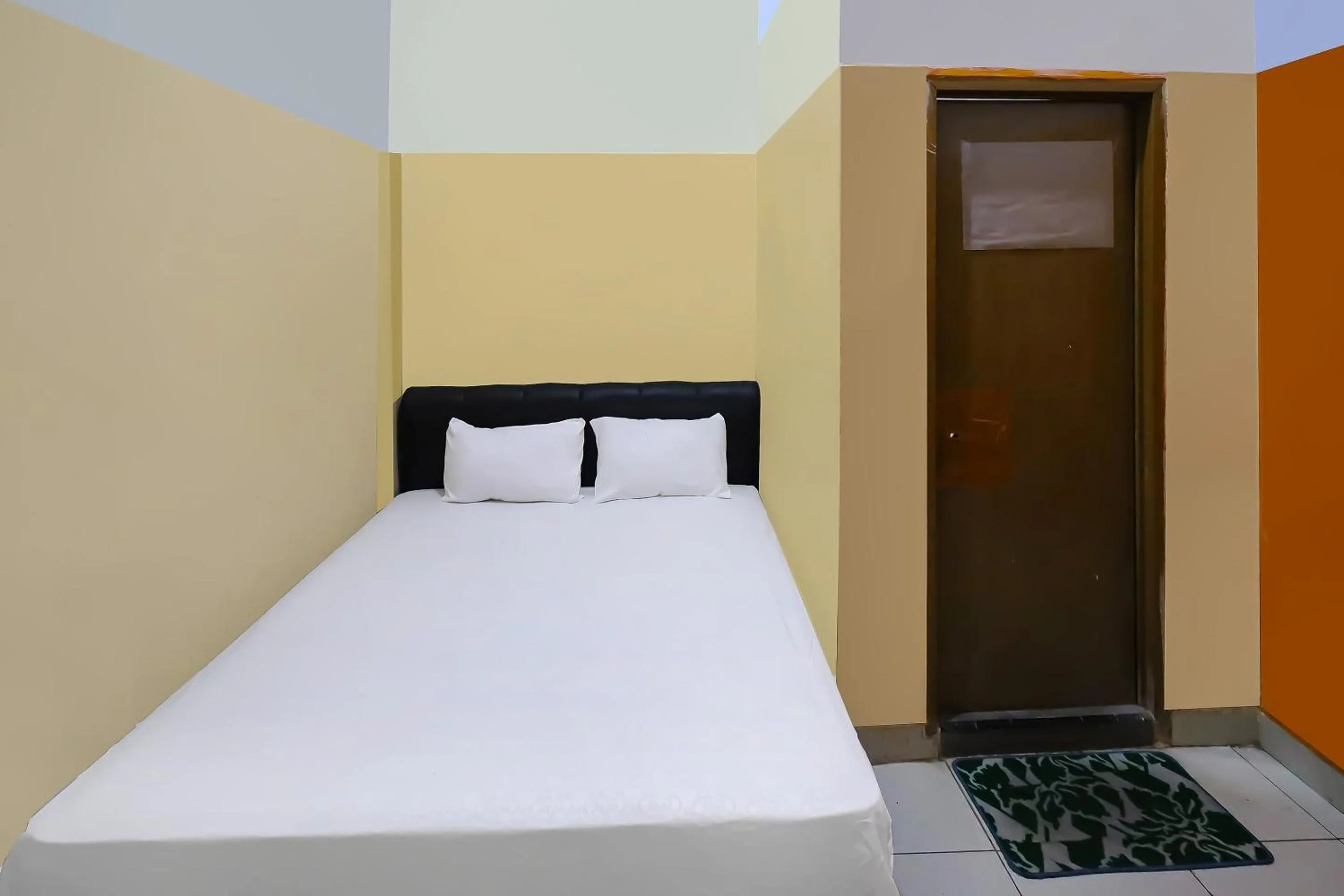 Bedroom in Hotel O Pondokan Tali Super