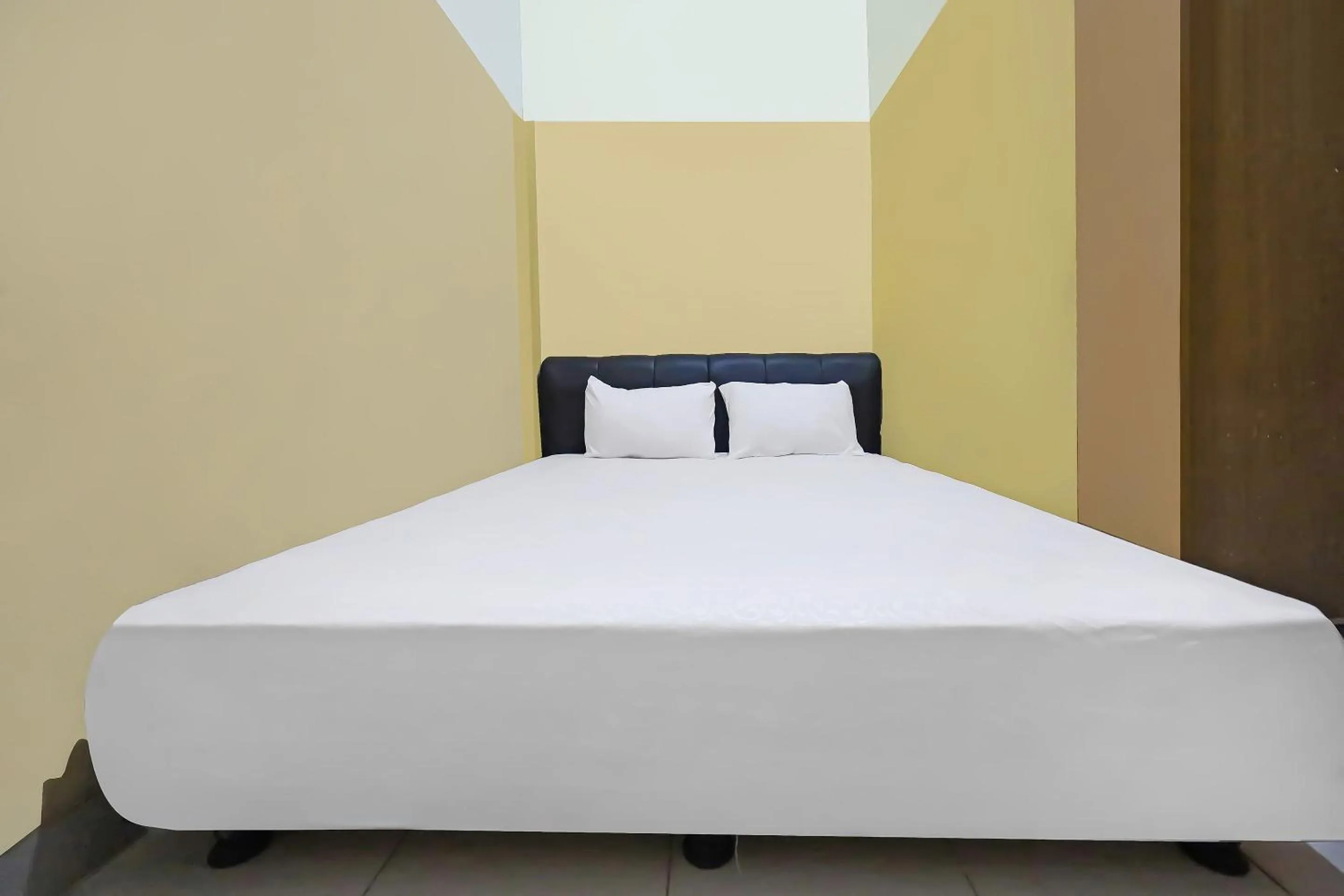 Bedroom in Hotel O Pondokan Tali Super