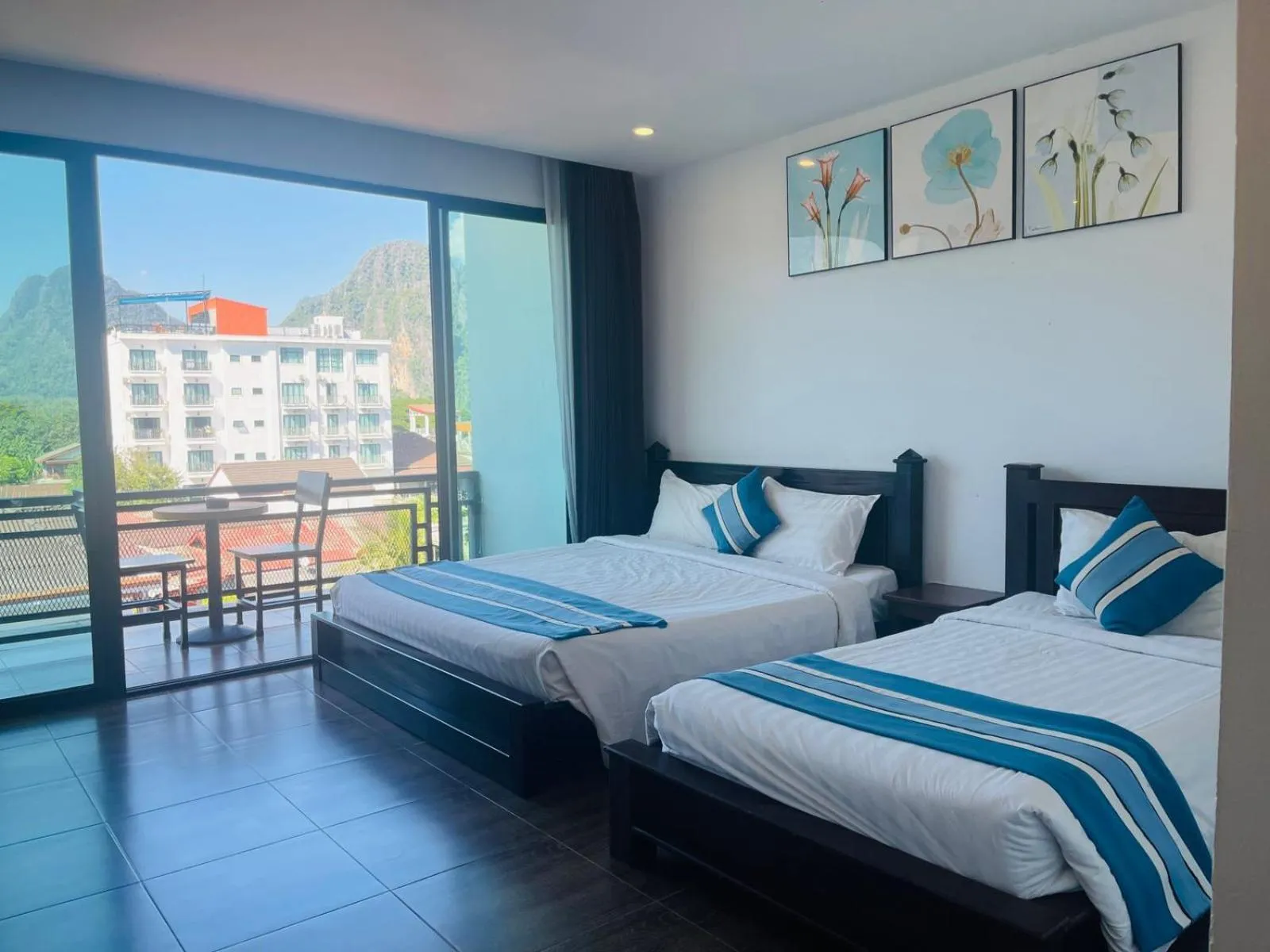 Bed in VANG VIENG TOPVIEW HOTEL