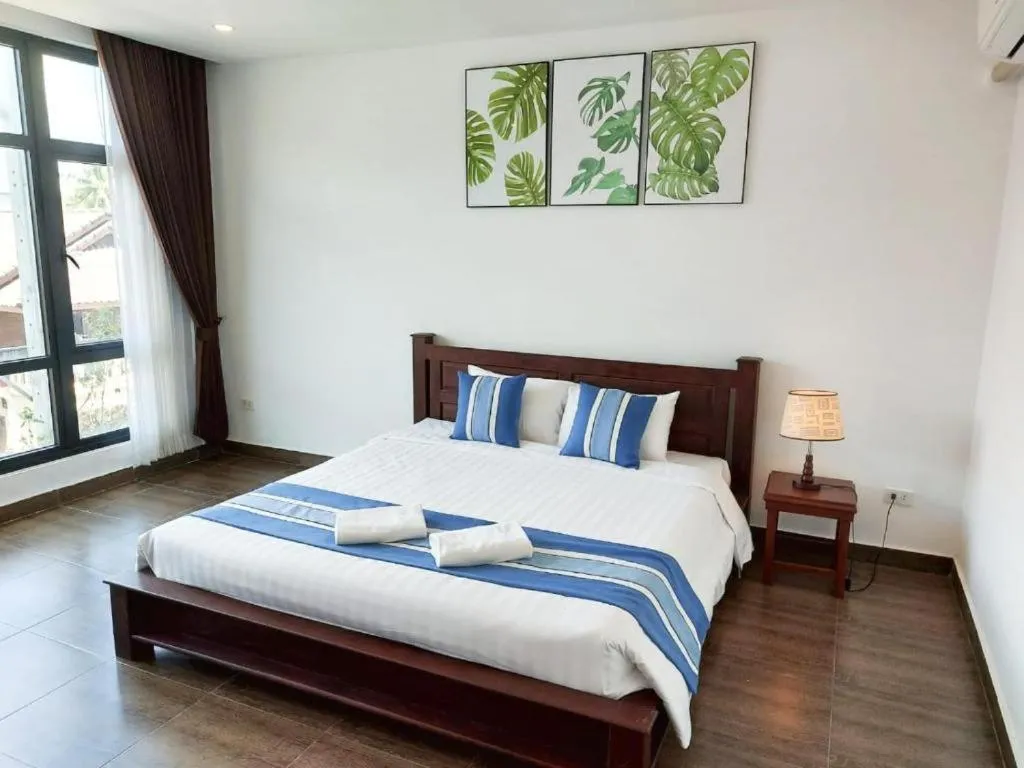 Bed in VANG VIENG TOPVIEW HOTEL