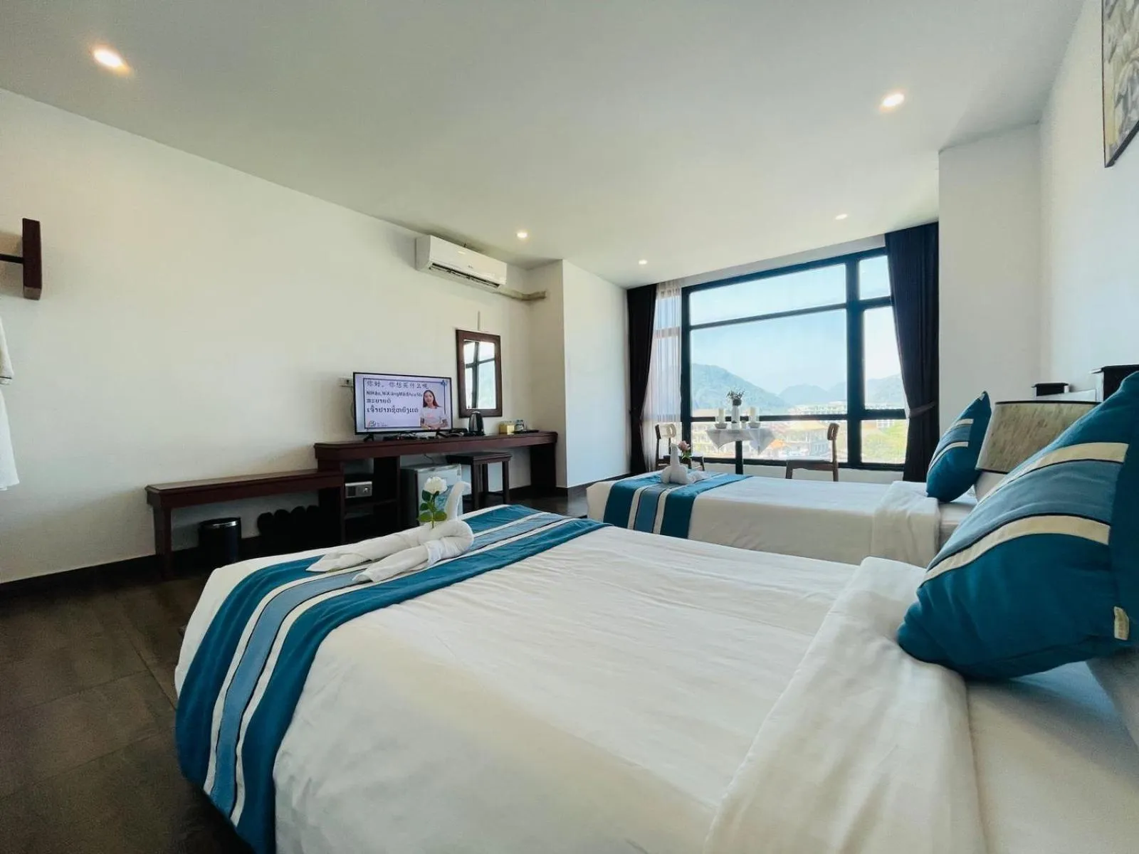 Bed in VANG VIENG TOPVIEW HOTEL