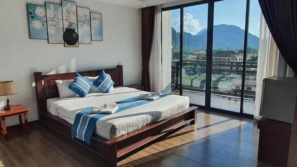 Bed in VANG VIENG TOPVIEW HOTEL