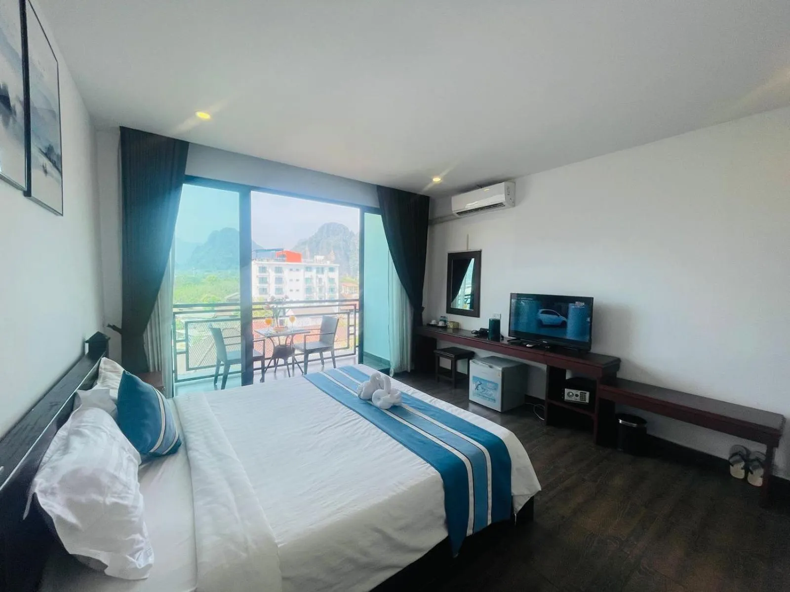 Bed in VANG VIENG TOPVIEW HOTEL