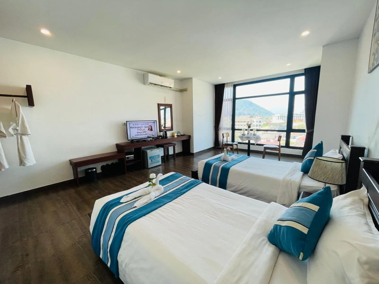 Bed in VANG VIENG TOPVIEW HOTEL