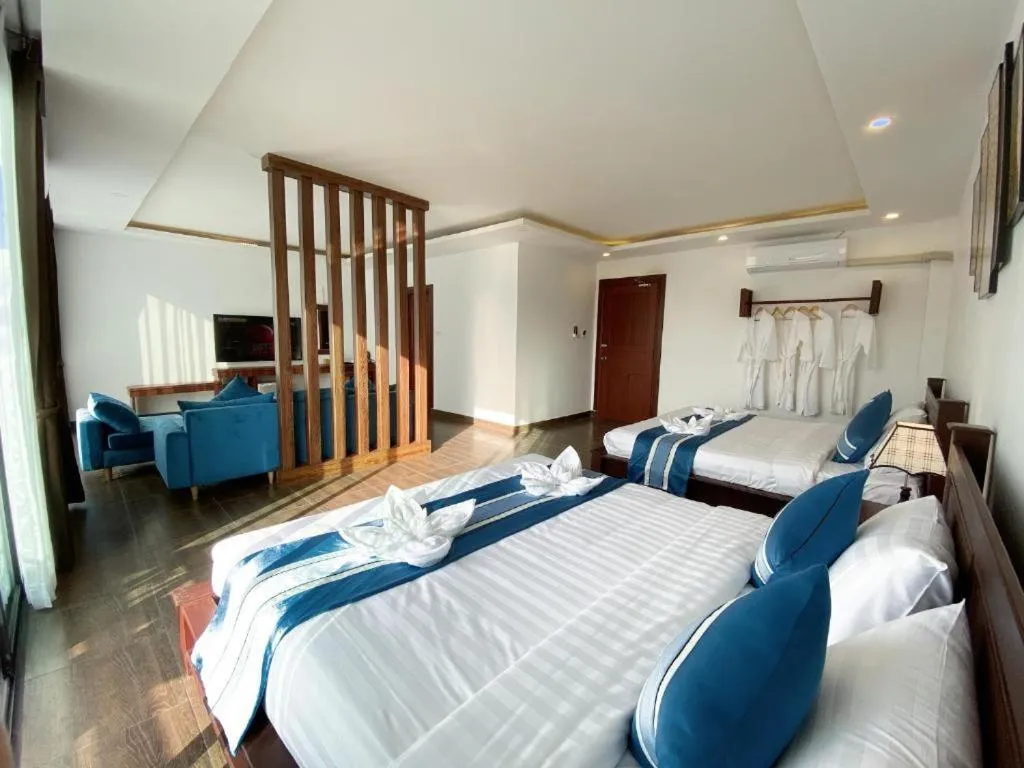 Bed in VANG VIENG TOPVIEW HOTEL