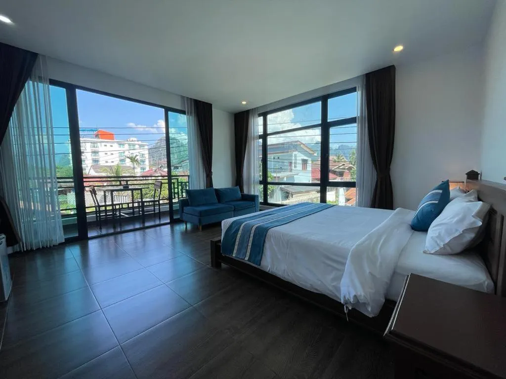 Bed in VANG VIENG TOPVIEW HOTEL