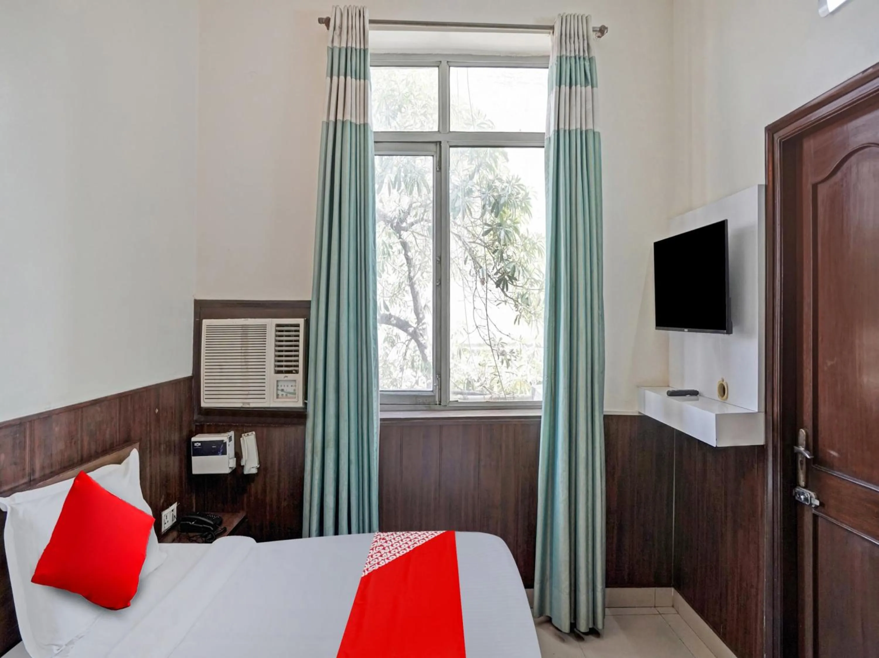 Bedroom in Hotel O Grand Stay