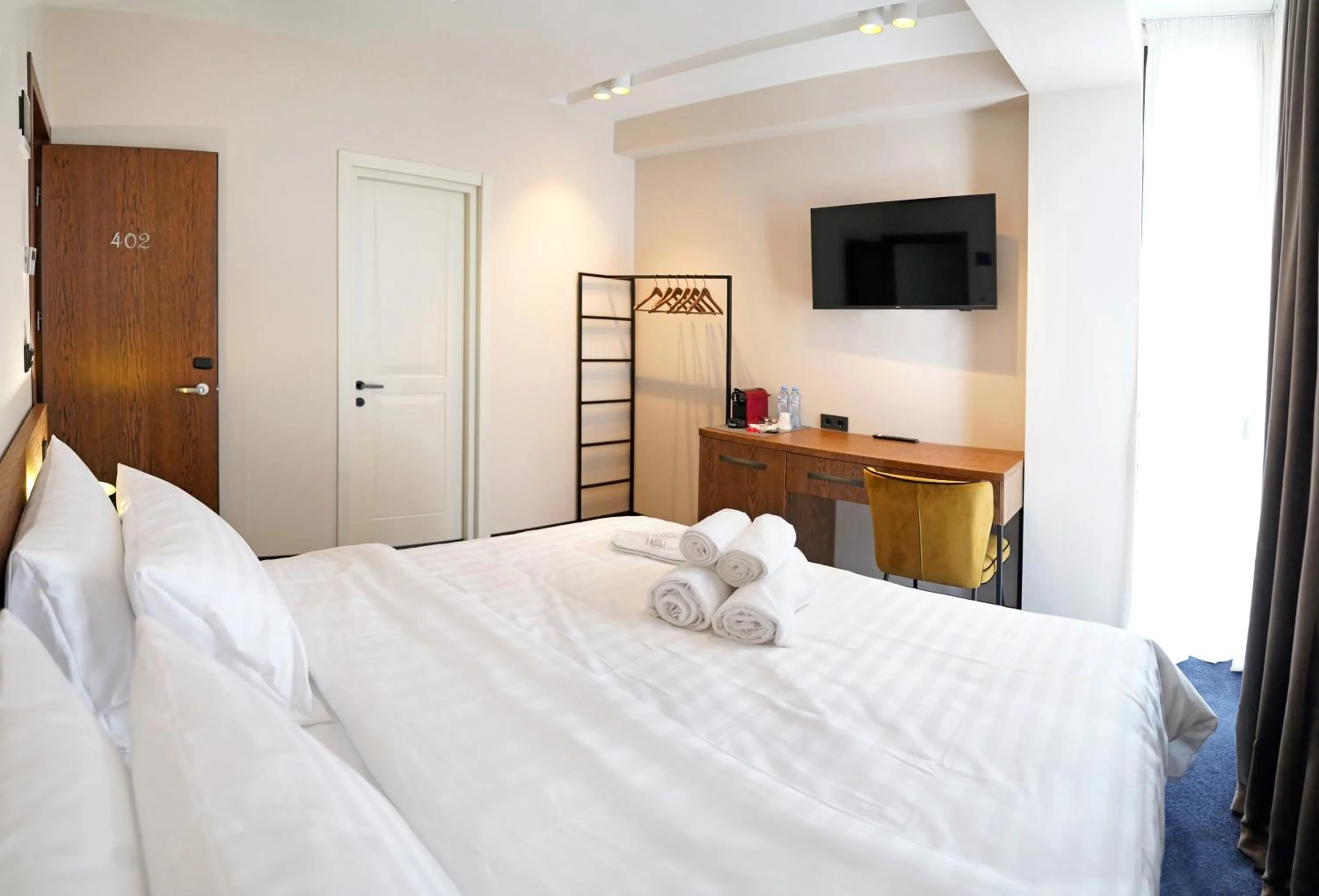 Bed in Hotel Tiflisi Inn