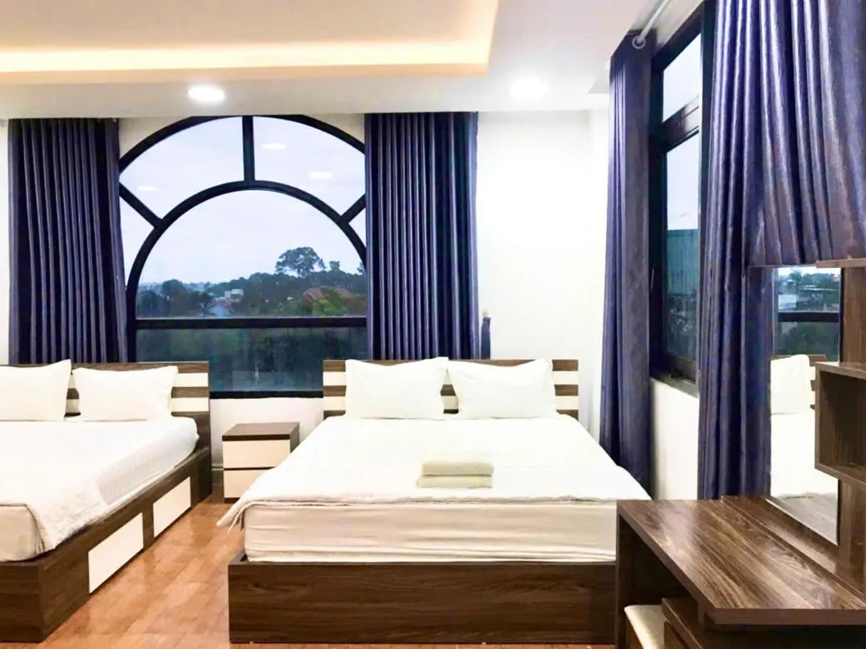 Bed in Hotel Hoa Cúc Phương Dĩ An - Bình Dương