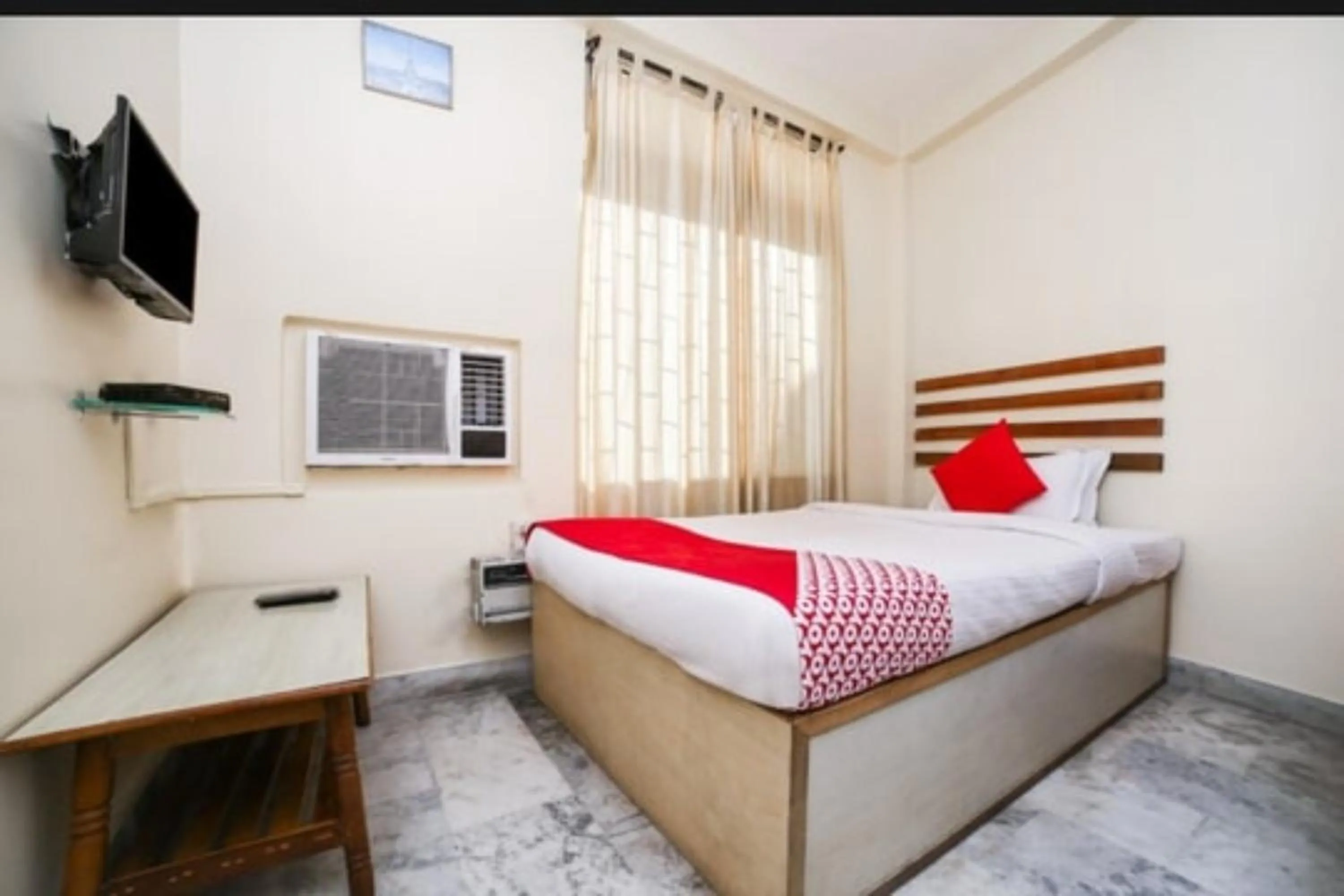 Bedroom in Uttam Guest House