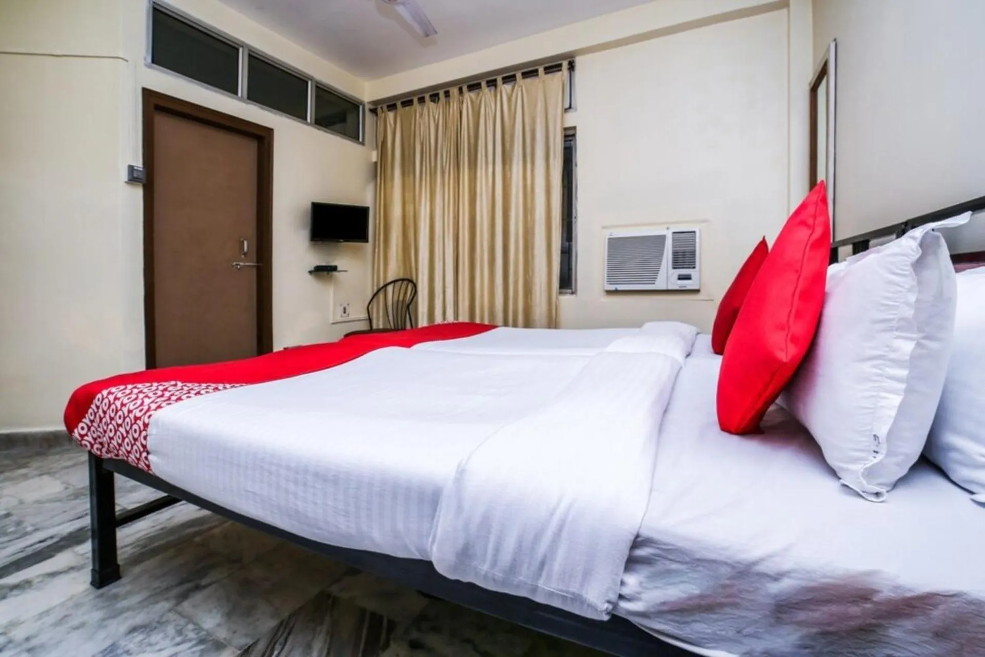 Bedroom in Uttam Guest House