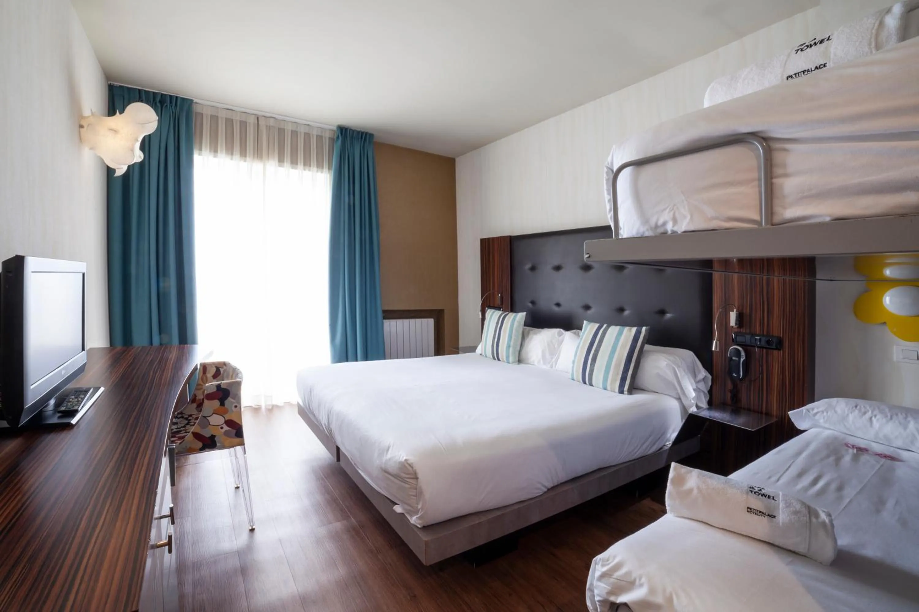 Bed in Petit Palace Tamarises