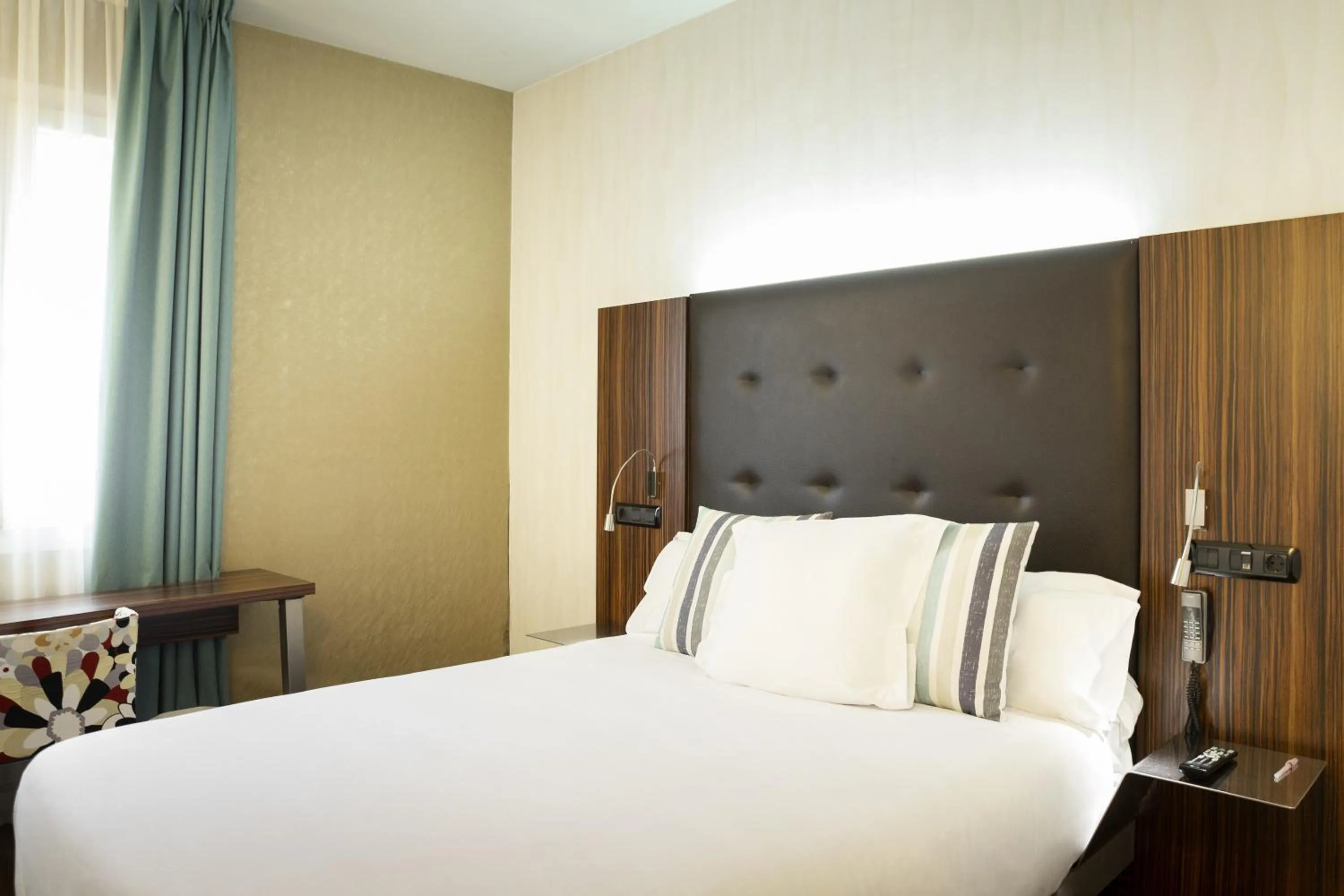 Bed in Petit Palace Tamarises