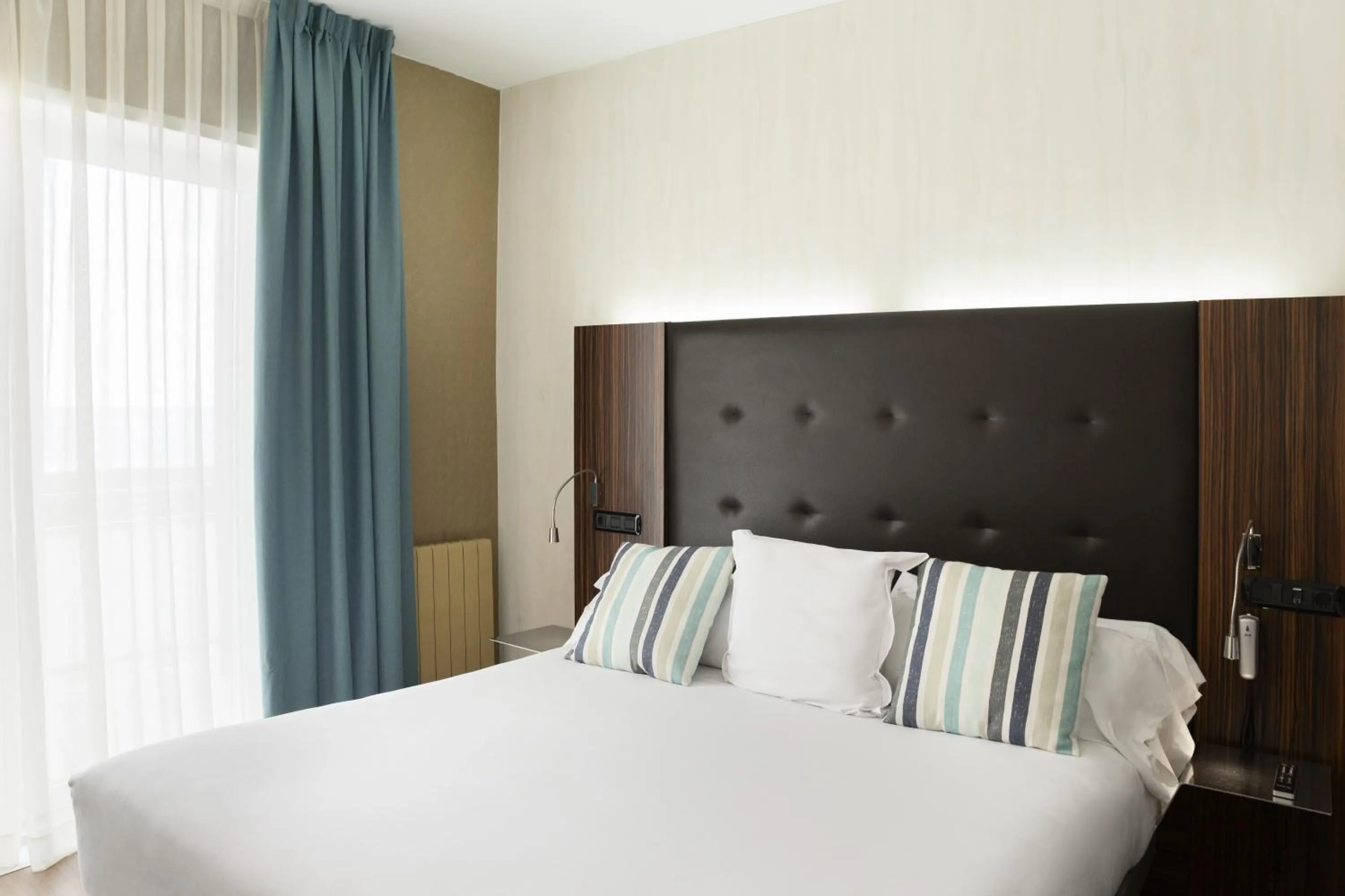 Bed in Petit Palace Tamarises