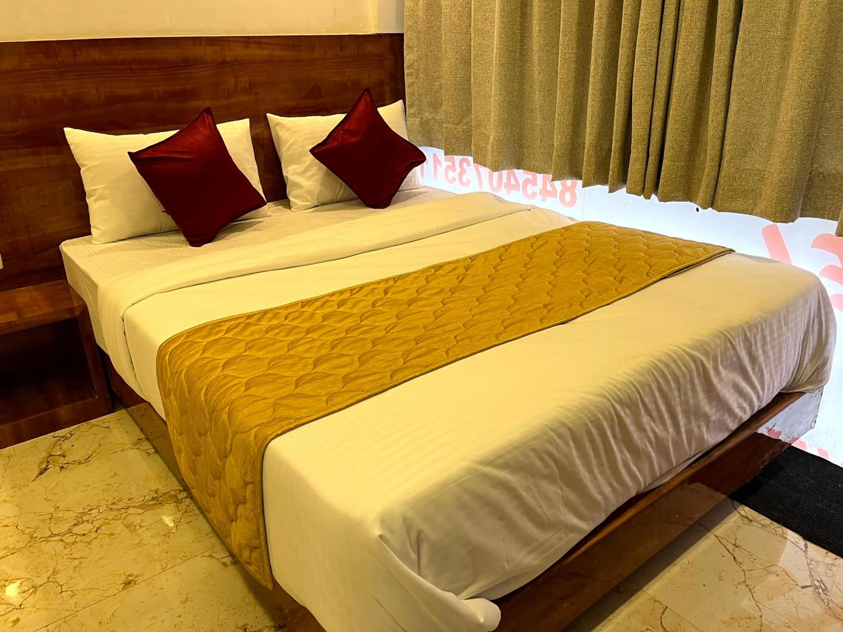 Photo of the whole room, Bed in Hotel Delmond Prime- Near NESCO