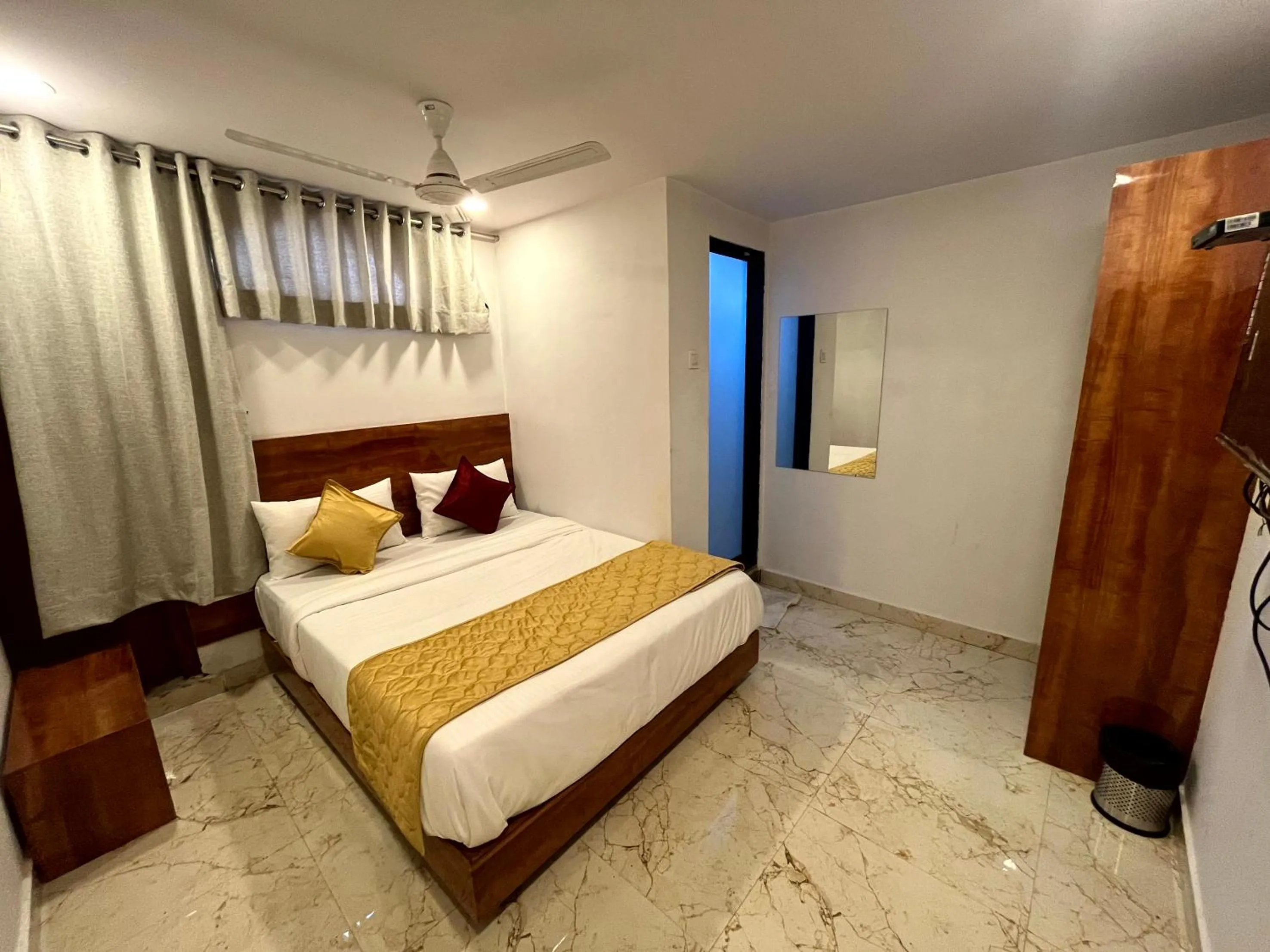 Photo of the whole room, Bed in Hotel Delmond Prime- Near NESCO