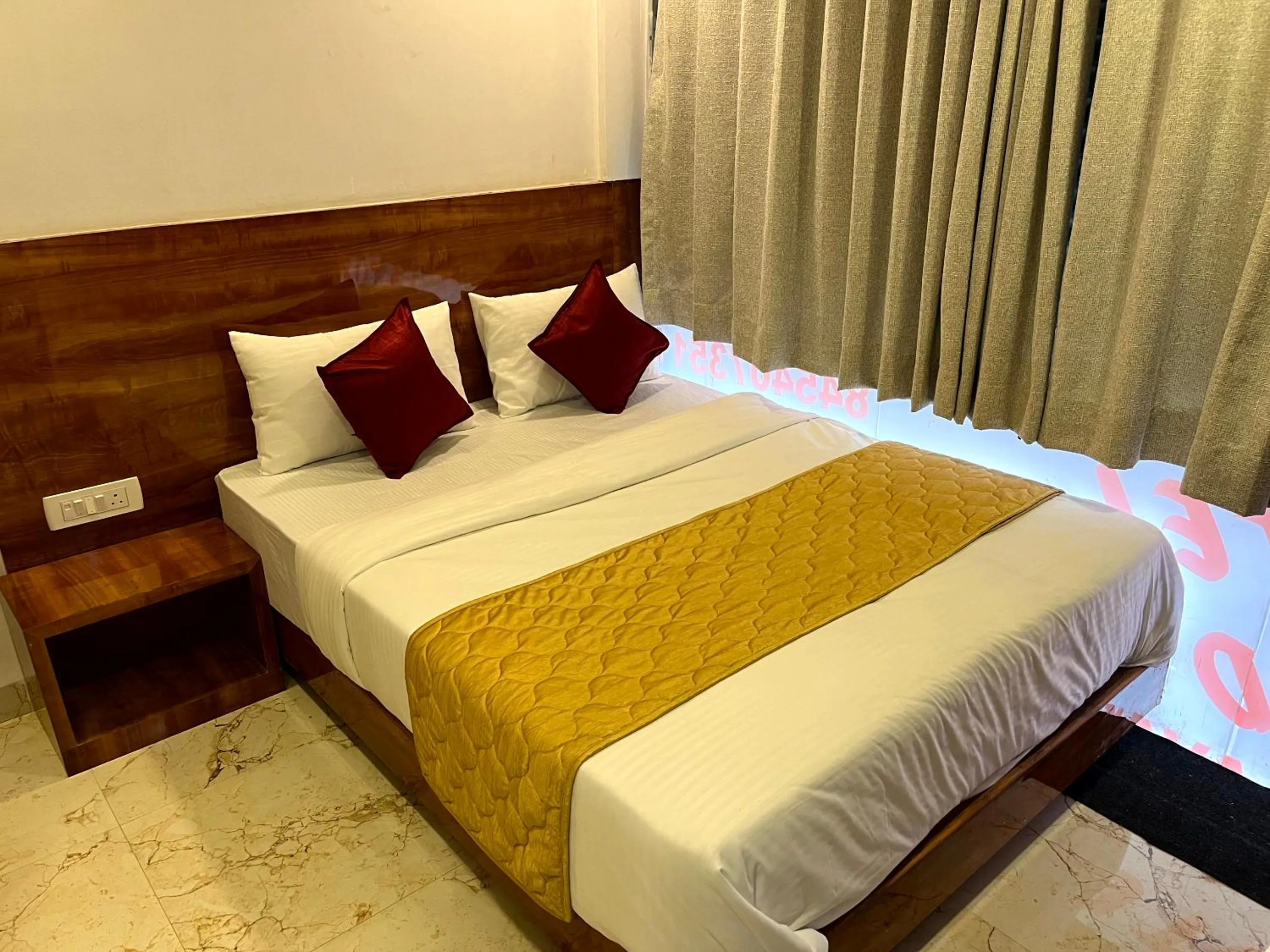 Photo of the whole room, Bed in Hotel Delmond Prime- Near NESCO