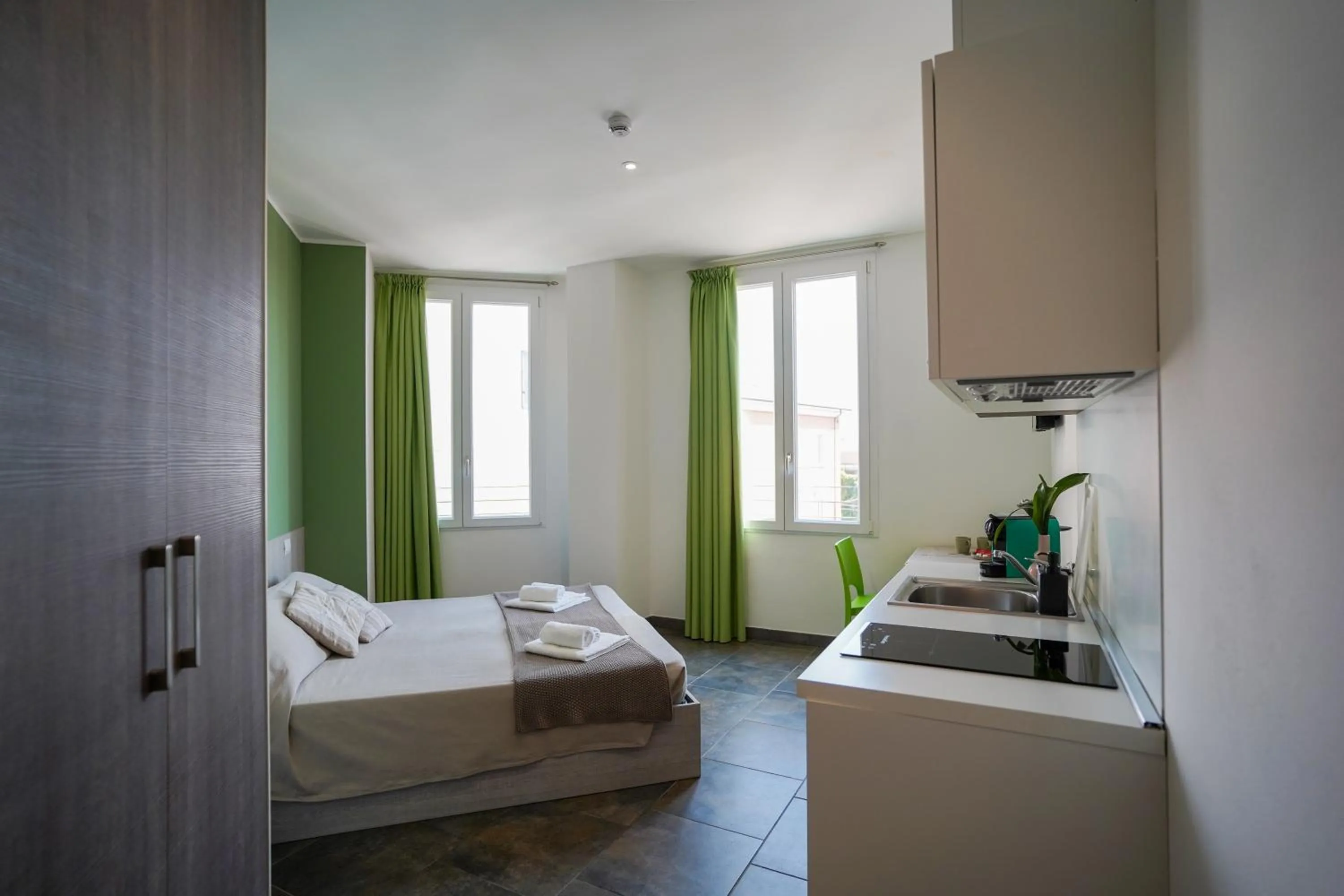 Kitchen or kitchenette, Bed in Bnbook Residence Matteotti