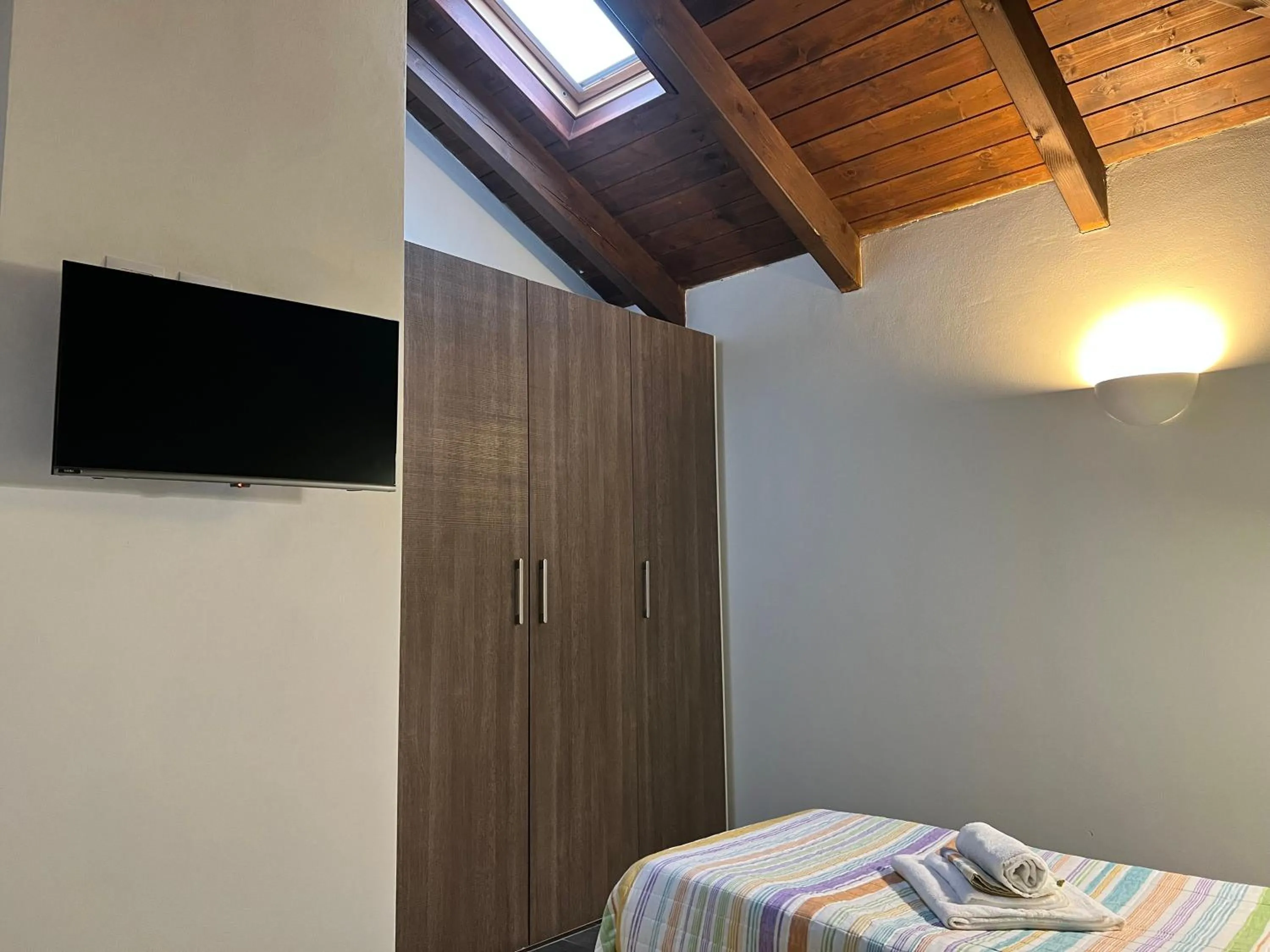 TV and multimedia, Bed in Bnbook Residence Matteotti