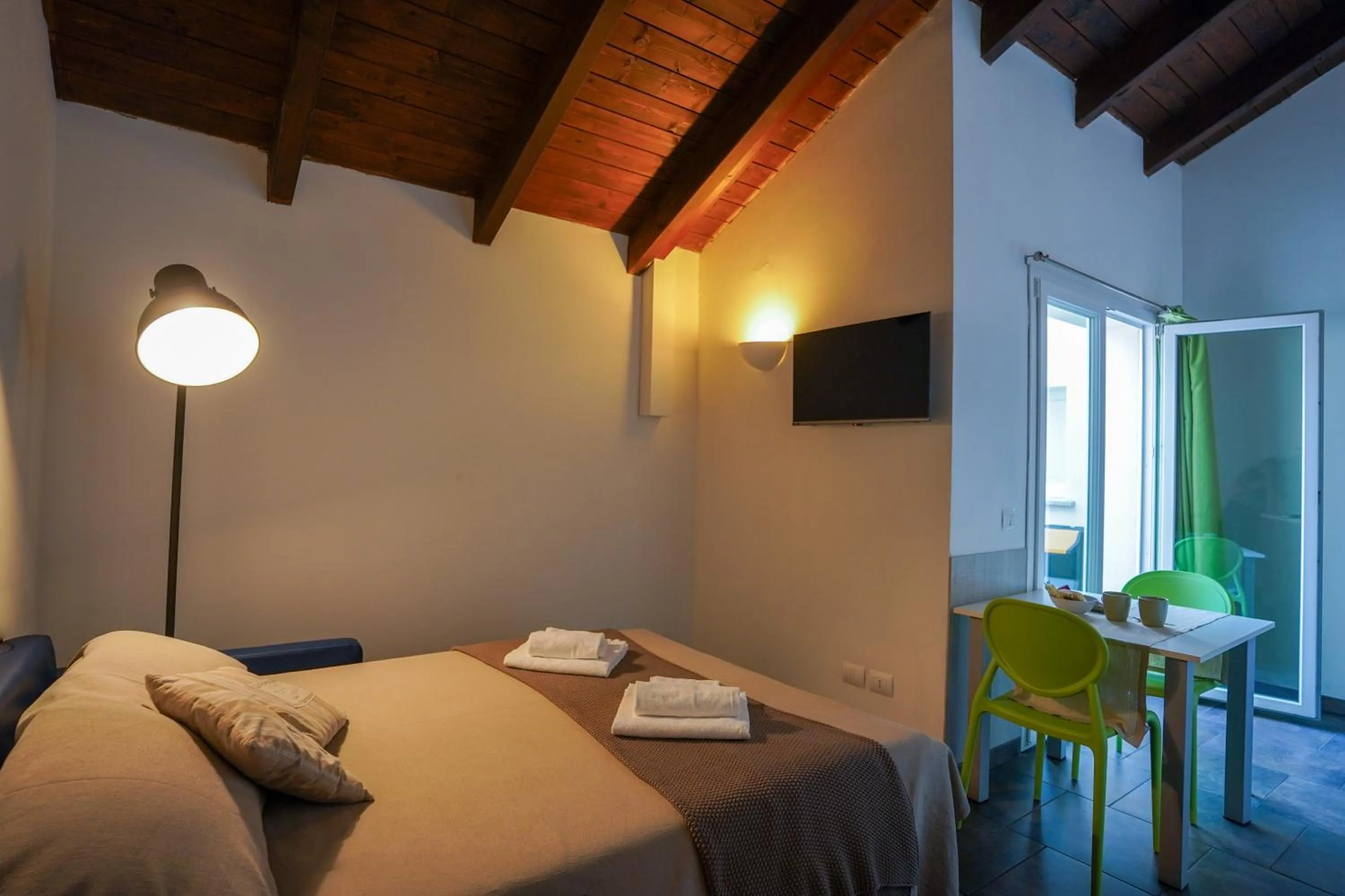 Seating area, Bed in Bnbook Residence Matteotti