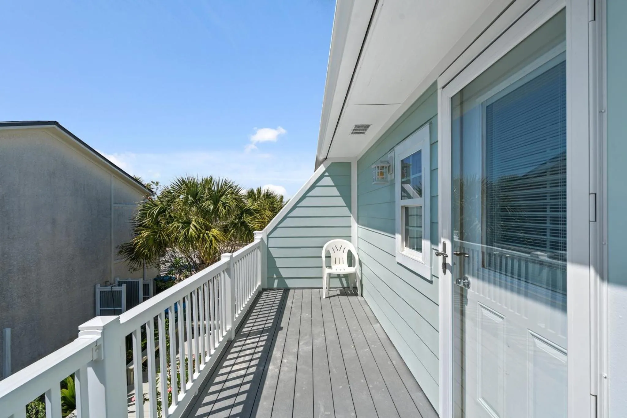 Balcony/Terrace in 140 Feet To White Sandy Beaches! Newly Renovated! Pool! Grill!