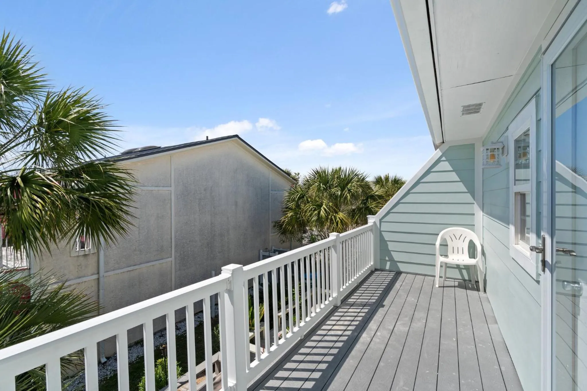 Balcony/Terrace in 140 Feet To White Sandy Beaches! Newly Renovated! Pool! Grill!