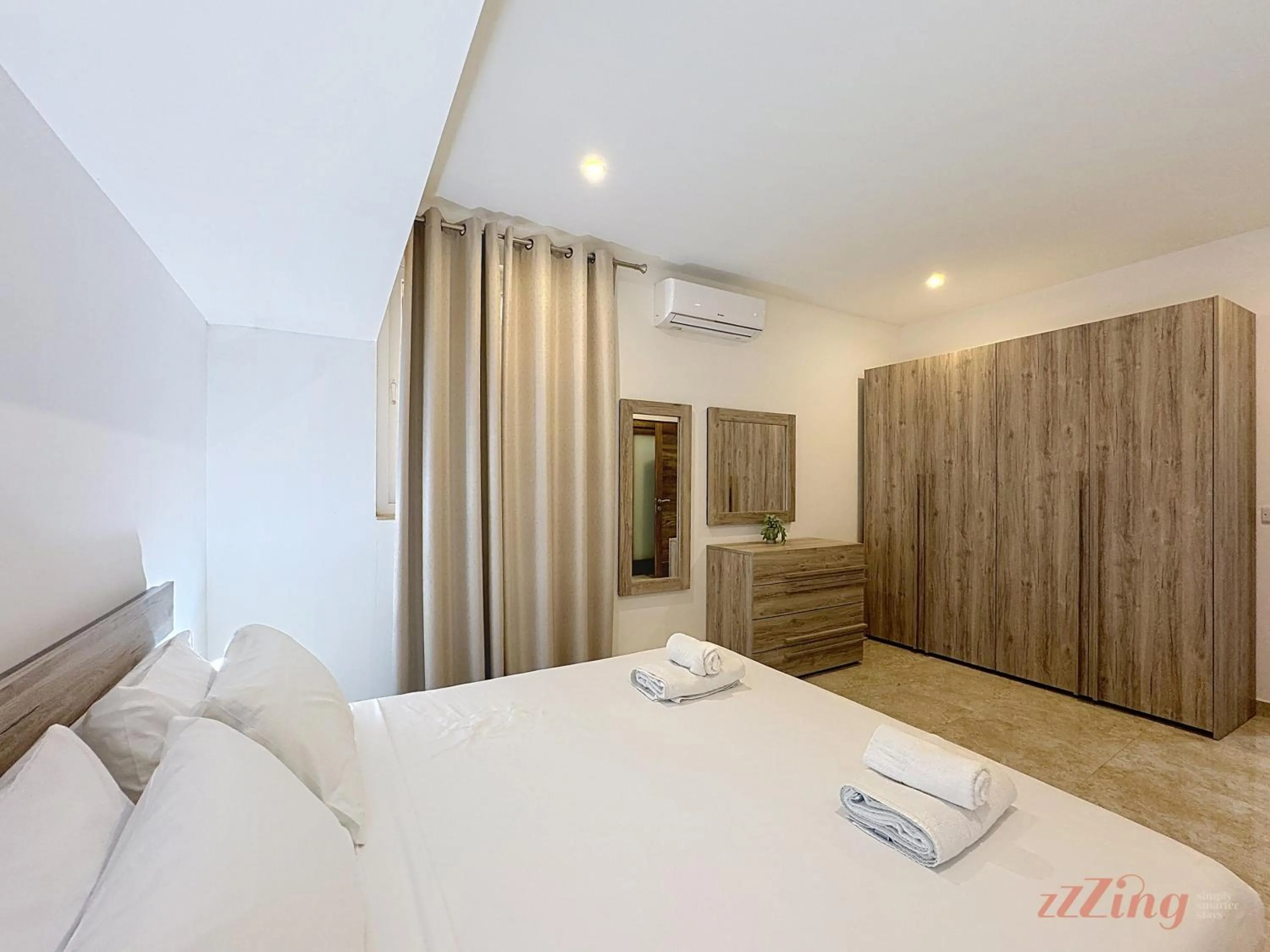 Bed in Scenic Gozo Apartment & Shared Pool