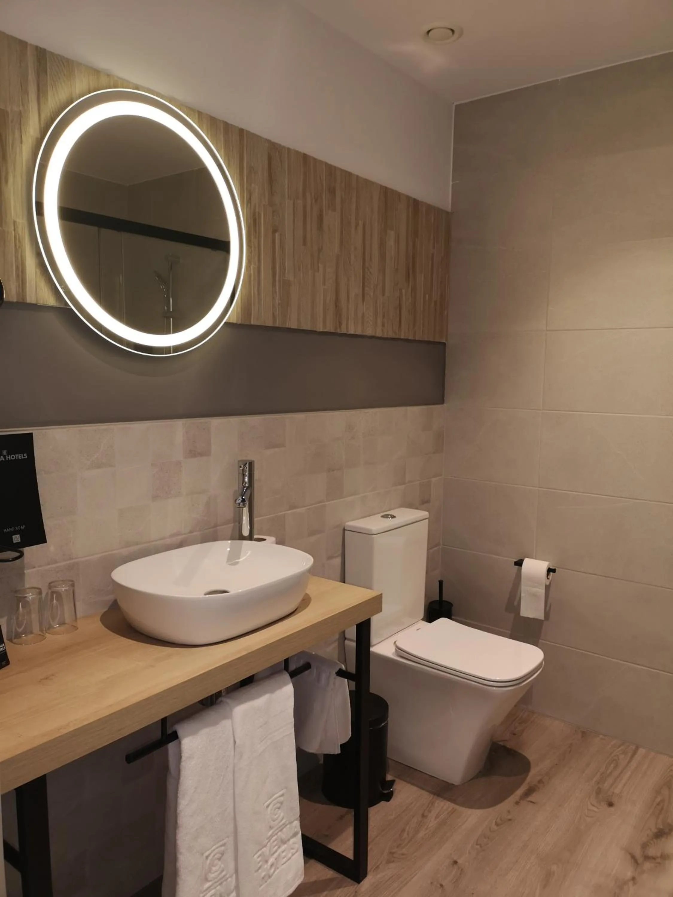 Bathroom in Hotel Coral Boutique by gaiarooms