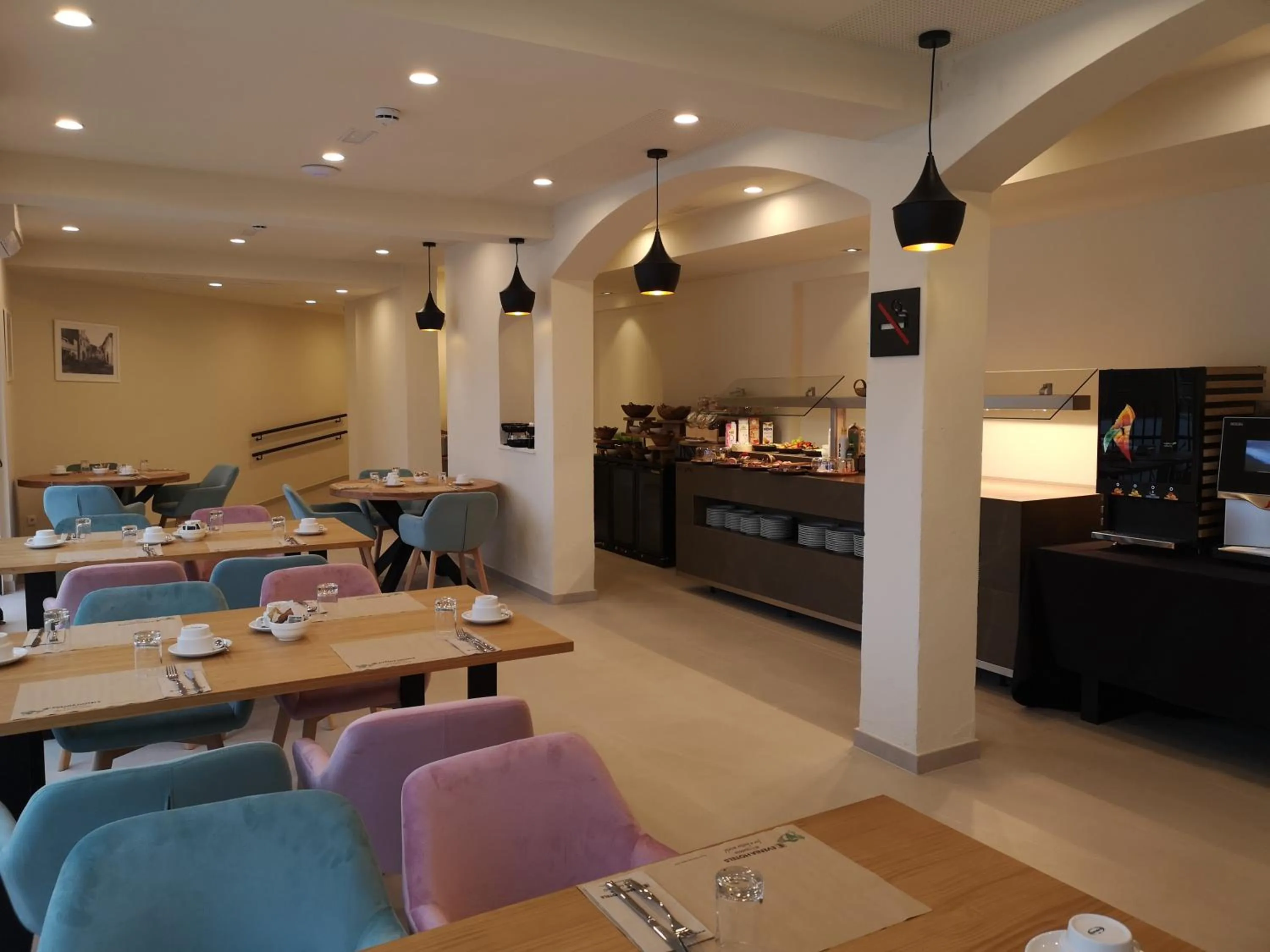 Dining area in Hotel Coral Boutique by gaiarooms