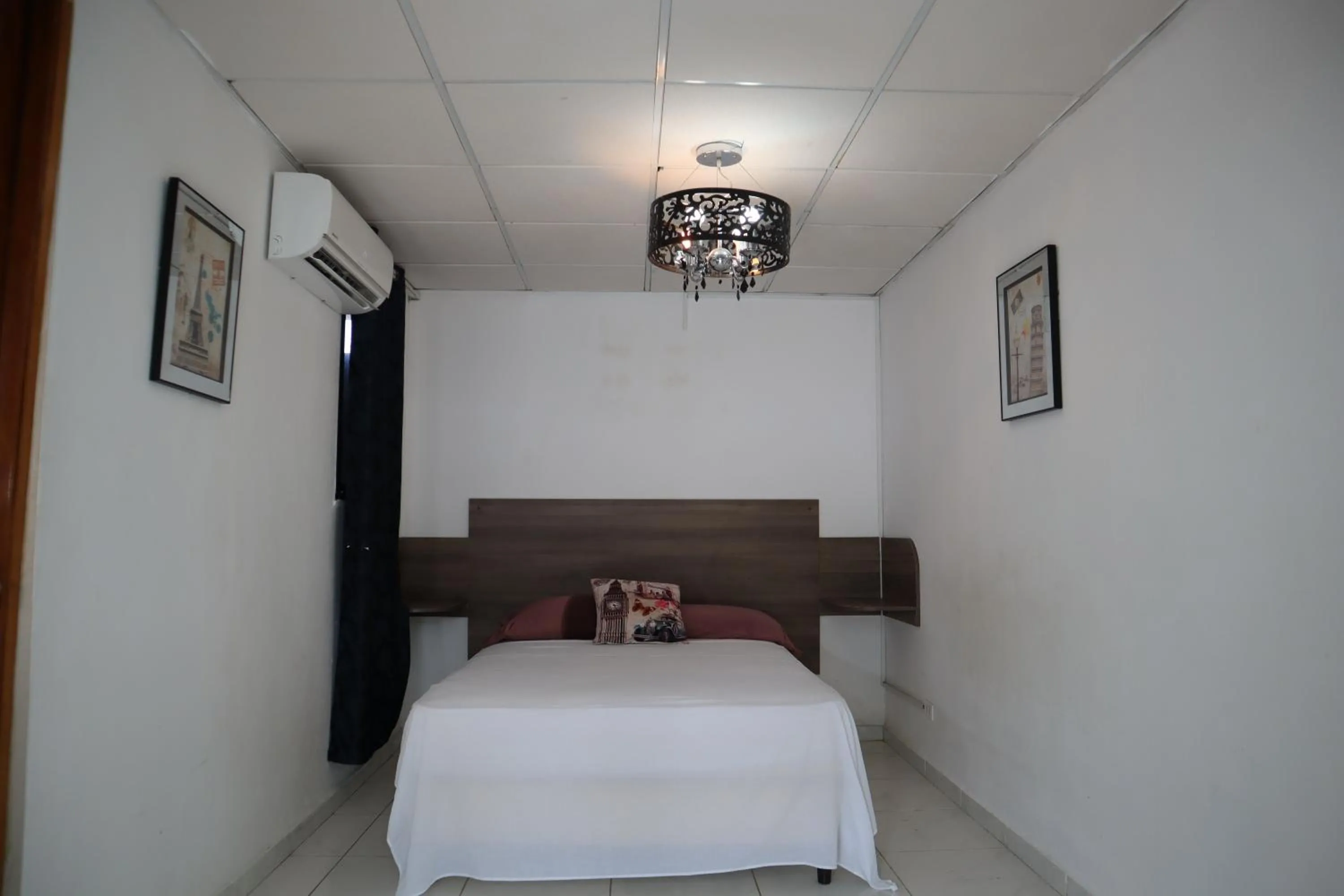 Bed in Pacific Coast Hotel