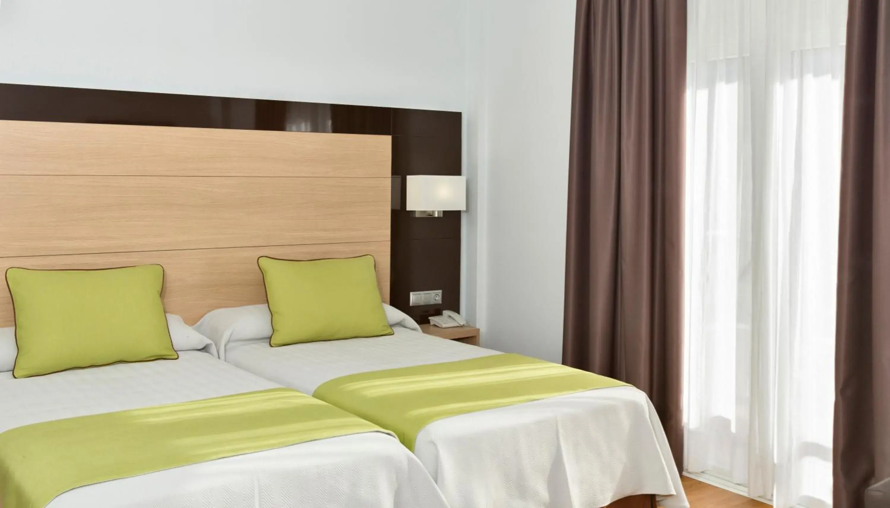 Bed in Hotel Baviera Bed in Hotel Baviera